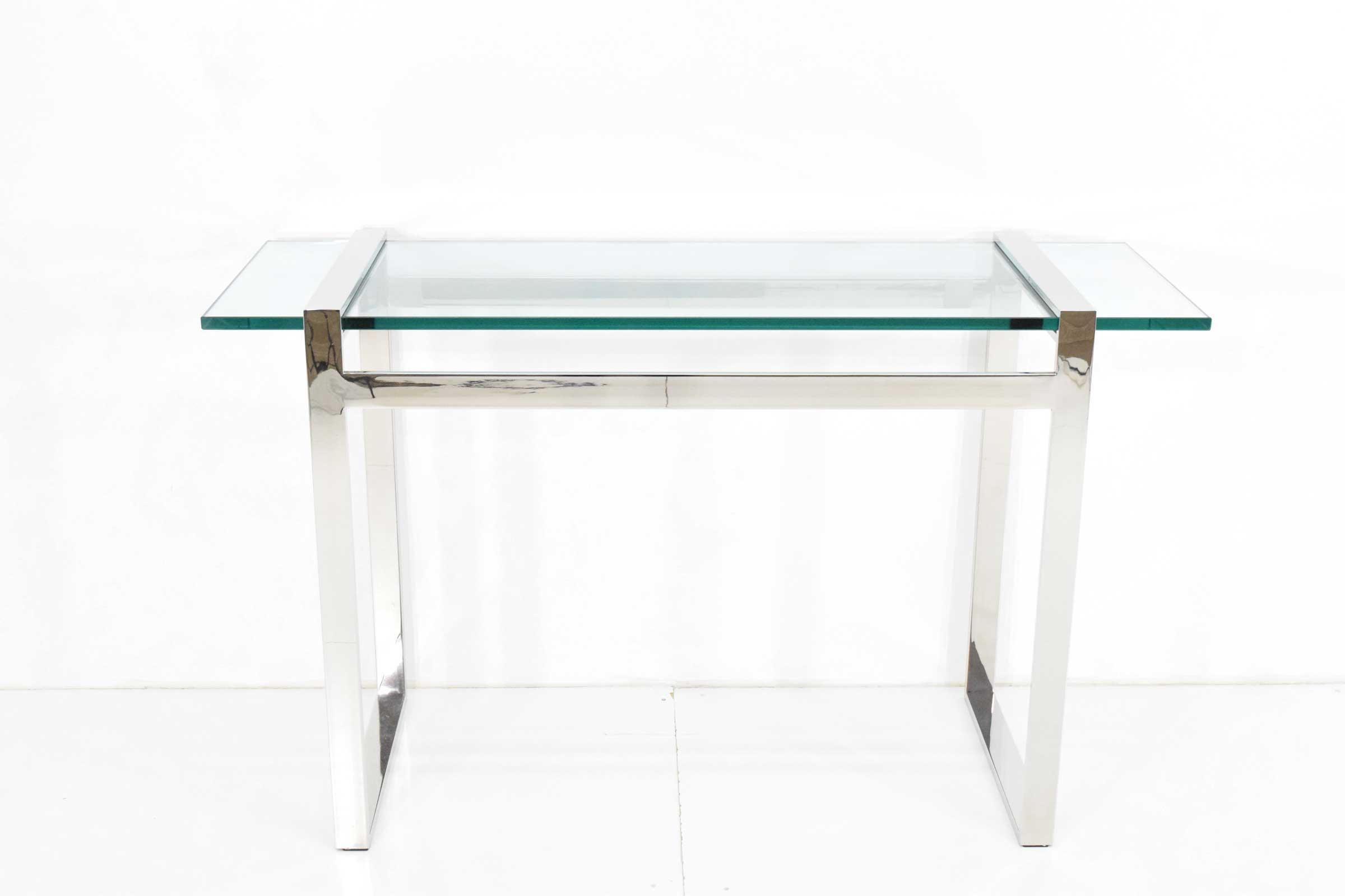 By Cy Mann and in style of Milo Baughman. Thick glass top is inserted through chrome frame. Corners are all finely fabricated so no seams. Great quality!.