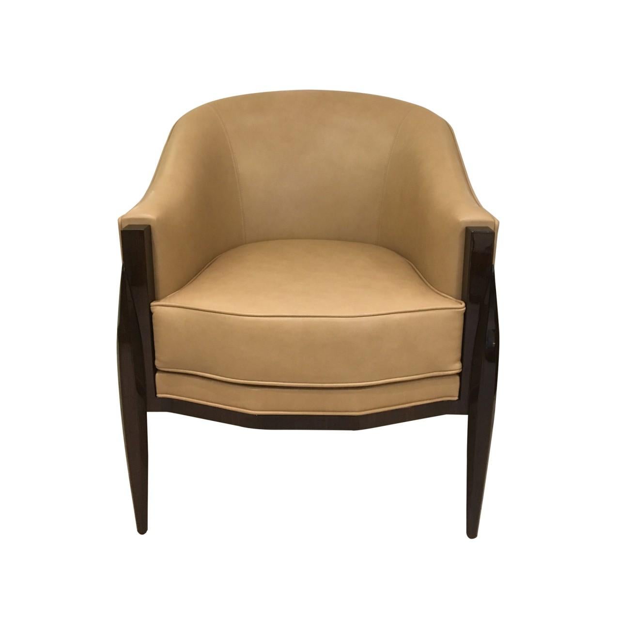 Art Deco chair with carved dark walnut legs and leather upholstery. Based on a Ruhlmann design, it can be an elegant guest chair for your office or the cozy bedroom accent chair, where you will enjoy your morning coffee and paper.
Handcrafted in