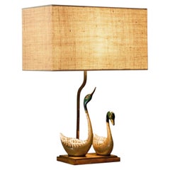Lampe de table 'Cygnes' en laiton patiné et lin France milieu du 20ème siècle