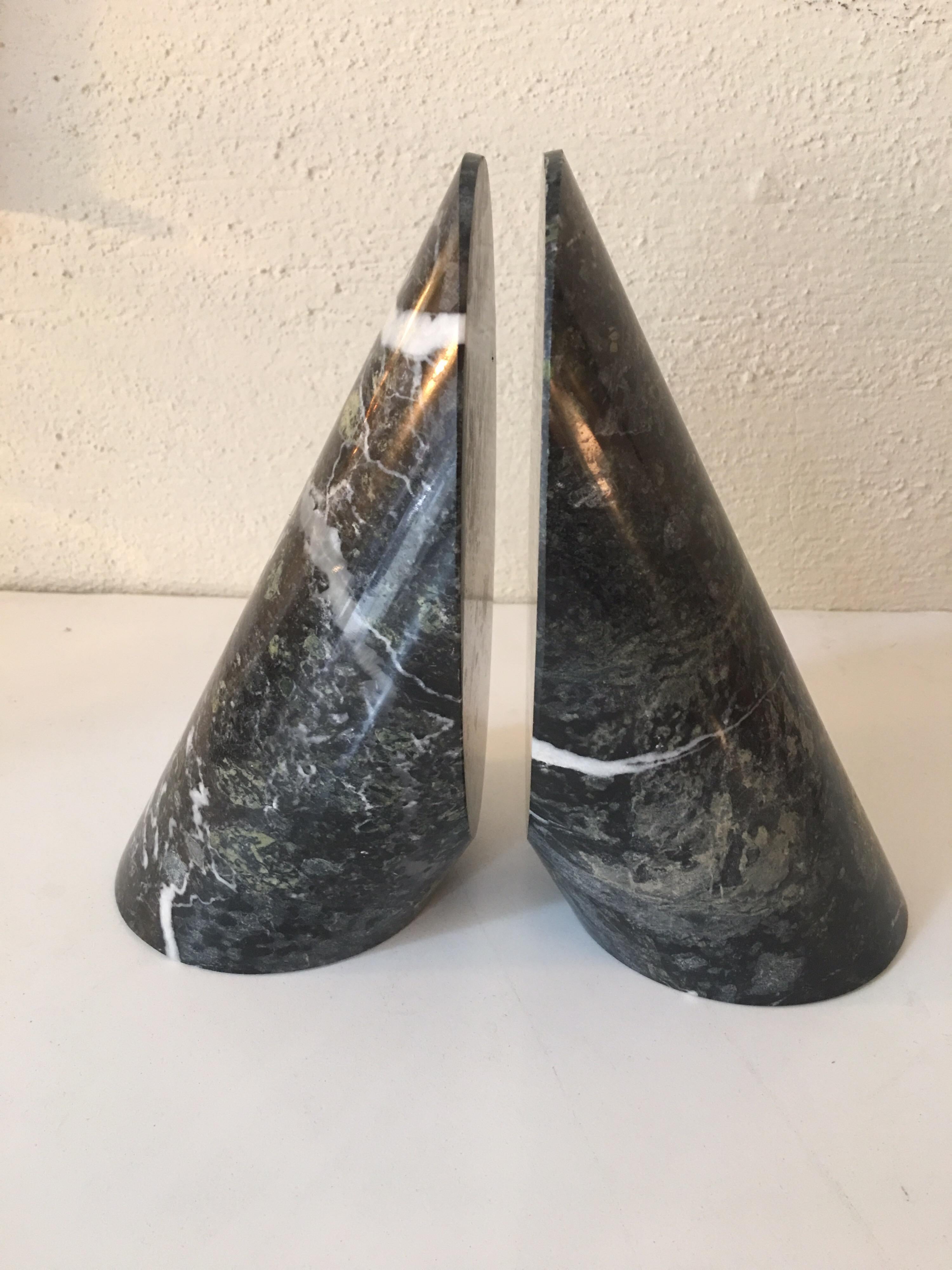Marble cylinders cut on an angle! Nice and heavy bookends with a unique slant! Marble in great shape with no chips and or dents.