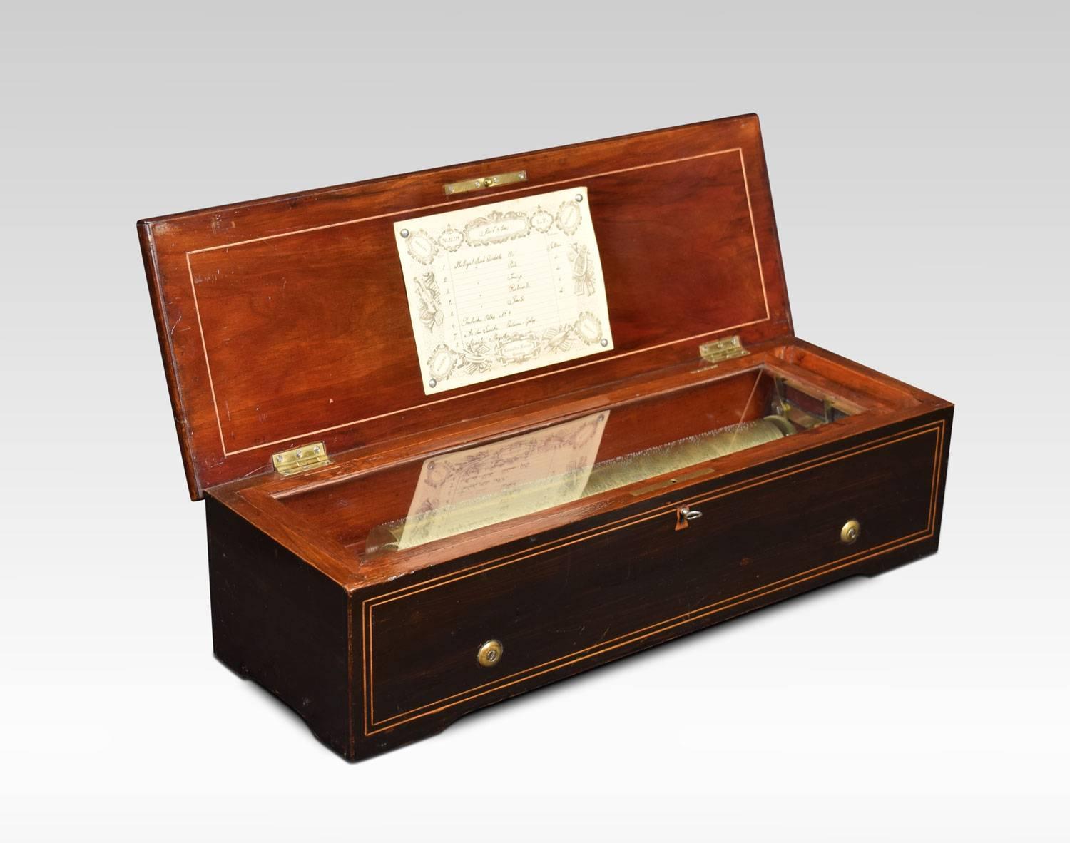 LeCoultre Freres music box playing on eight airs, with original tune sheet, no. 35904 and 13? Cylinder, bearing the maker's name stamped on the comb and the brass bed plate, within a rosewood case, the lid inlaid with boxwood lines and a central