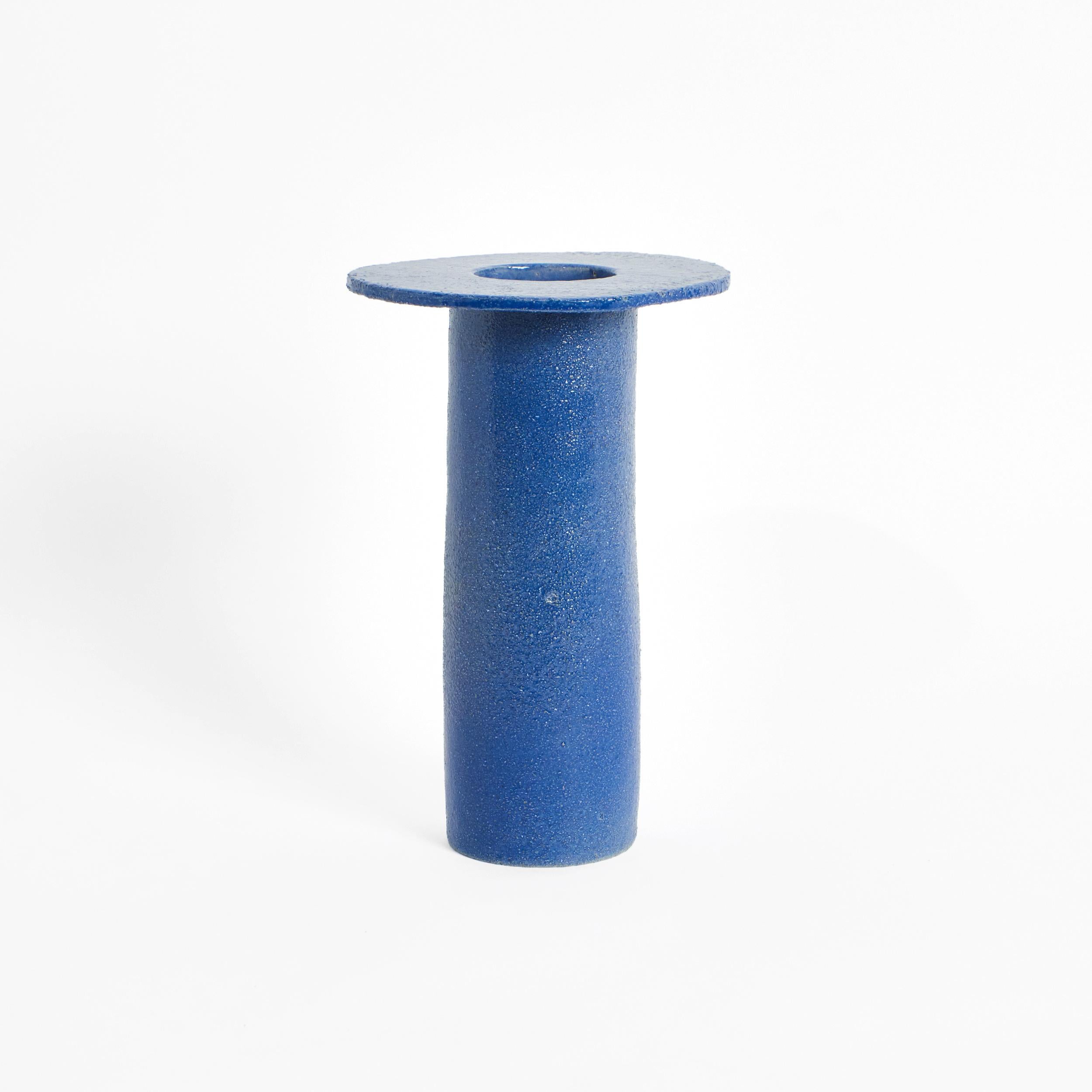 Cylinder vase in blue by Project 213A
Dimensions: D 19 x W 19 x H 29 cm
Materials: Ceramic. 

Tall and slender with a flat face, the vase is a playful combination of geometric shapes. Sculpted by hand in limited edition and finished with a artisanal