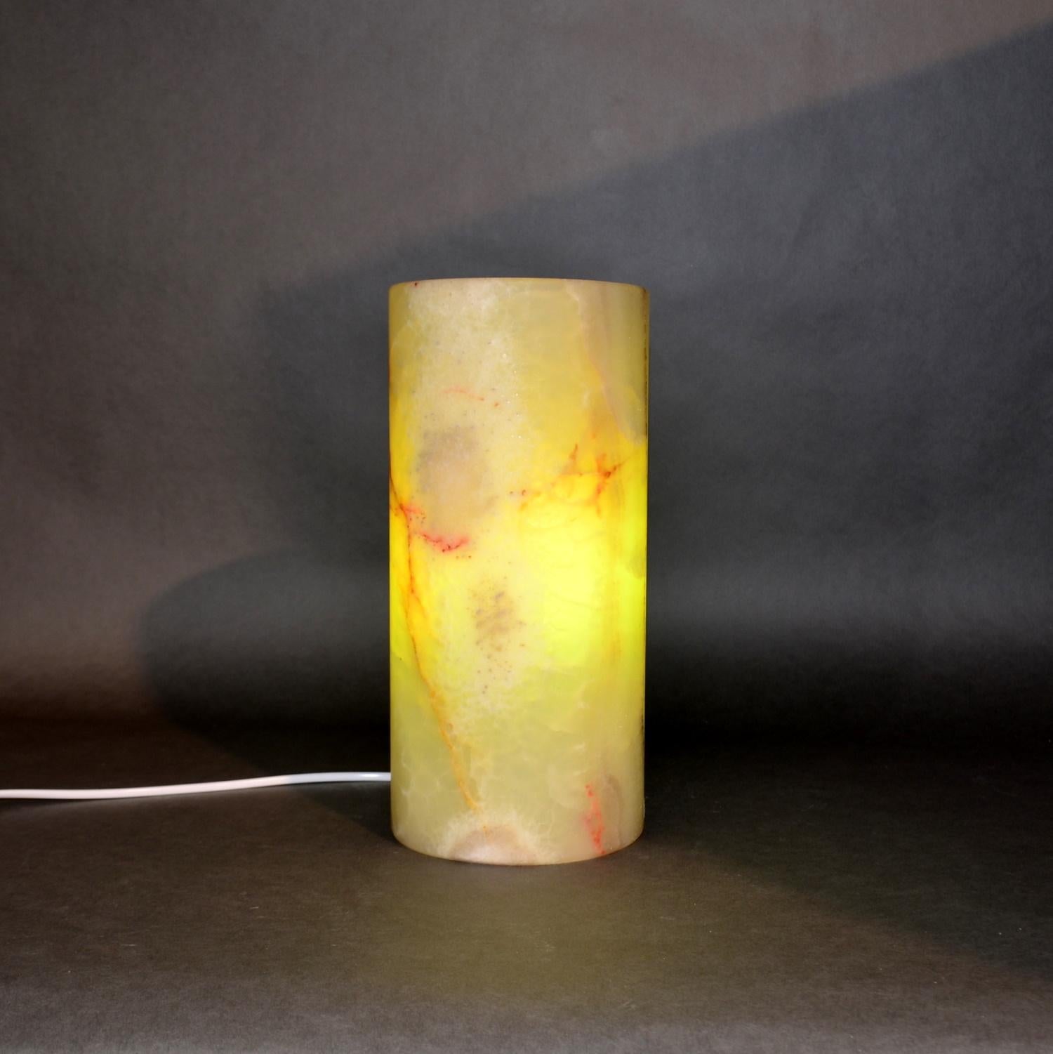Onyx lamps

Although there are a few other places in the world where the semi-precious stone Onyx exist, we found our collection in Mexico.

A bit of information on The Semi-Precious Stone Onyx.
While it is often thought of as the black