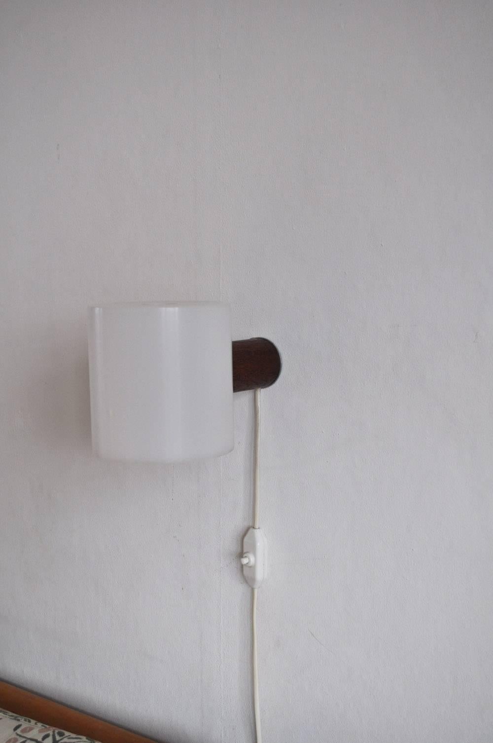 Scandinavian Modern Cylindric Teak and Acrylate Wall Lamp Designed by Uno & Östen Kristiansson For Sale