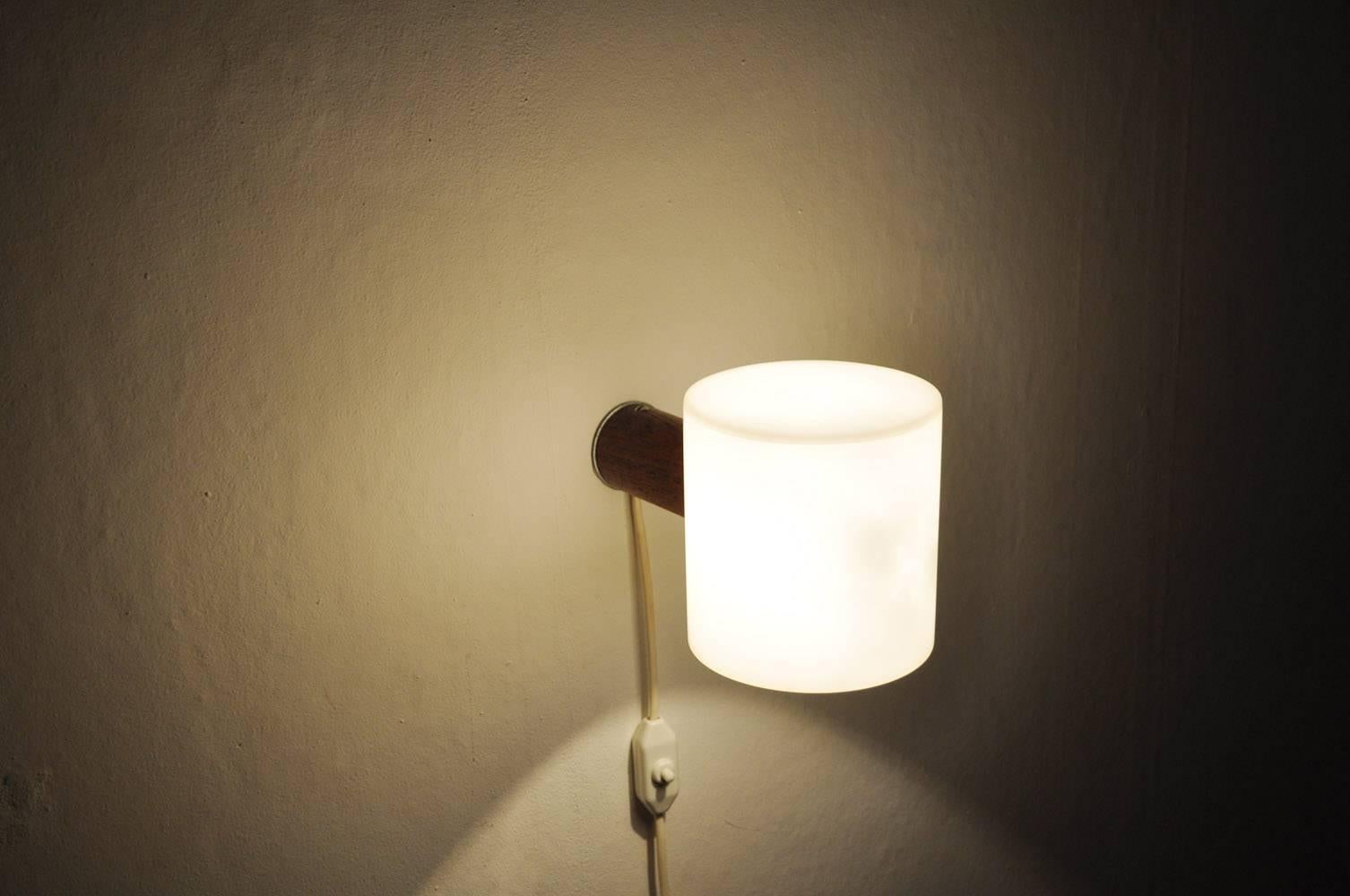 Plastic Cylindric Teak and Acrylate Wall Lamp Designed by Uno & Östen Kristiansson For Sale