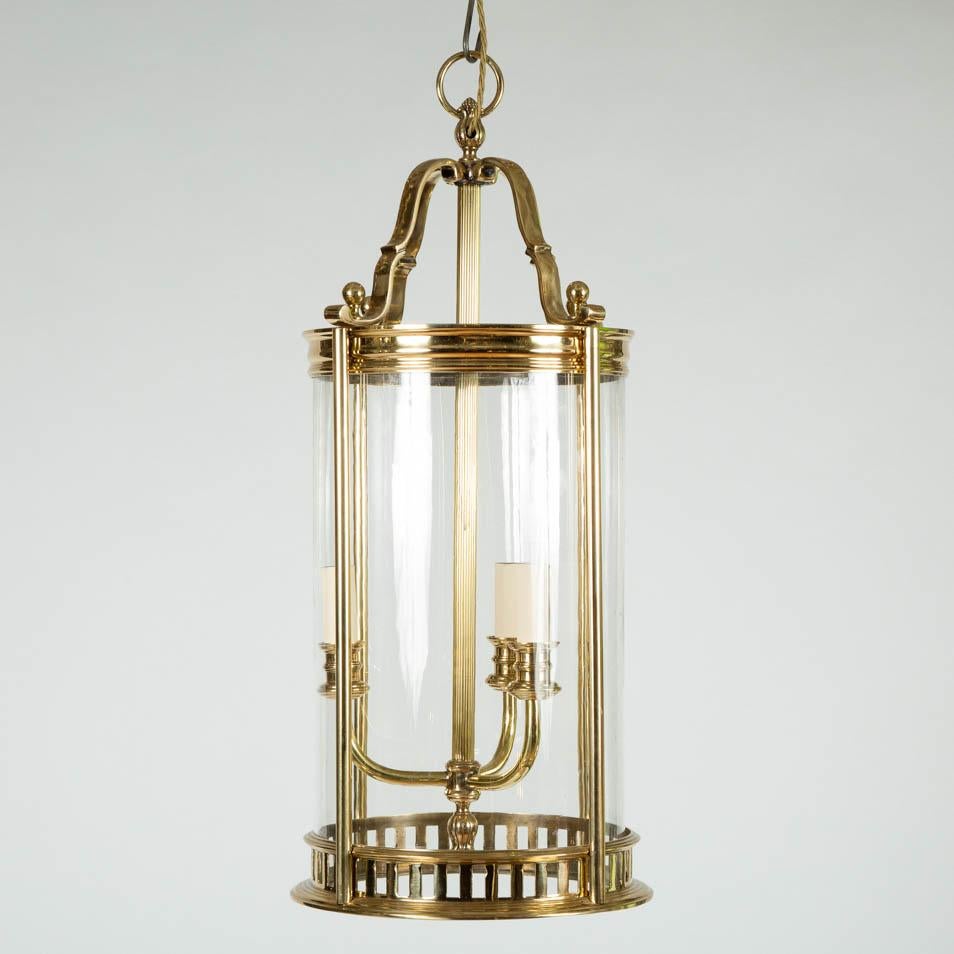 A fine quality 1950s glazed cylindrical brass hall lantern, with 3 internal lights. 

Re-wired.