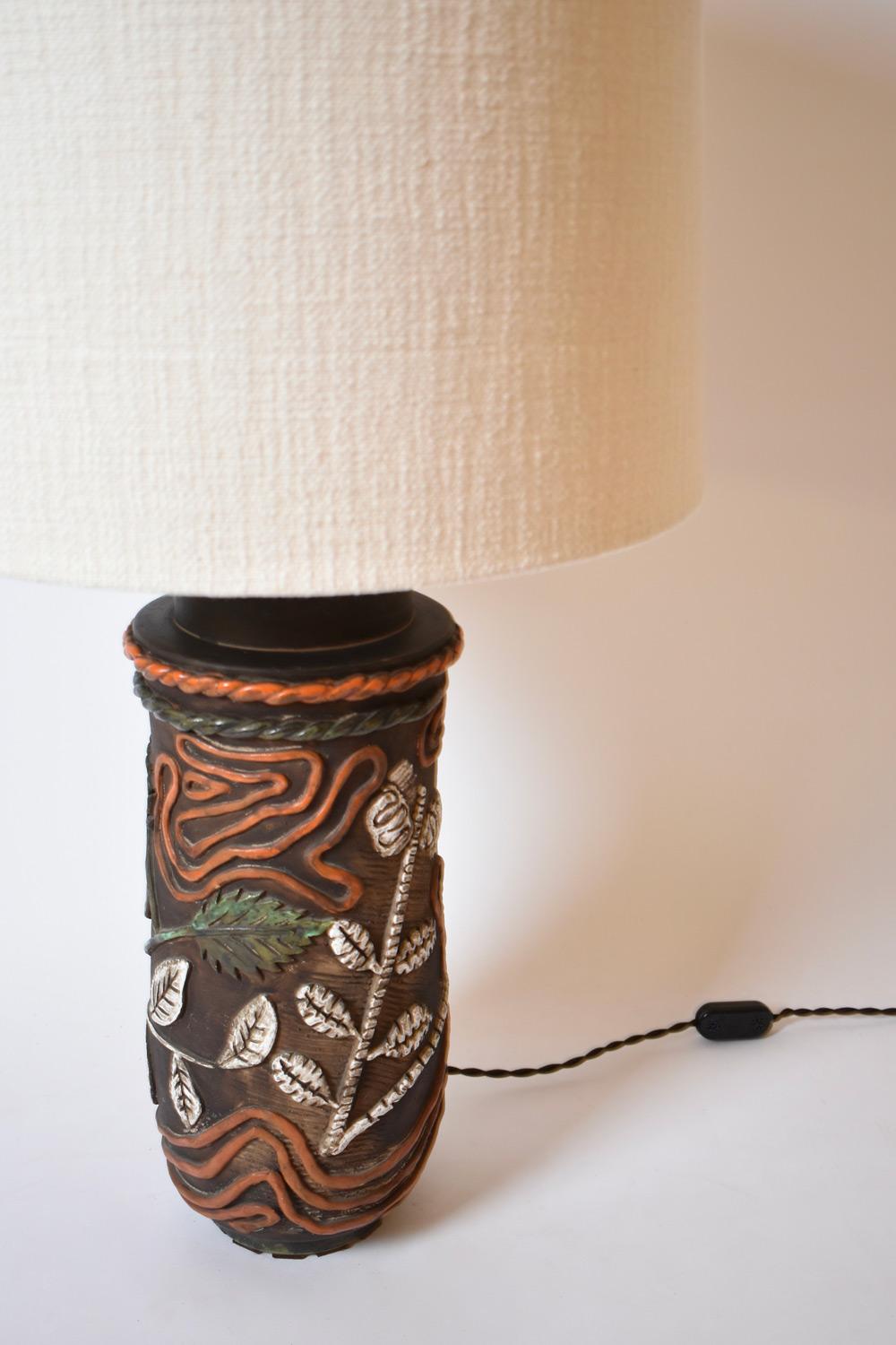French Cylindrical foliage pattern ceramic lamp, 1960s. For Sale