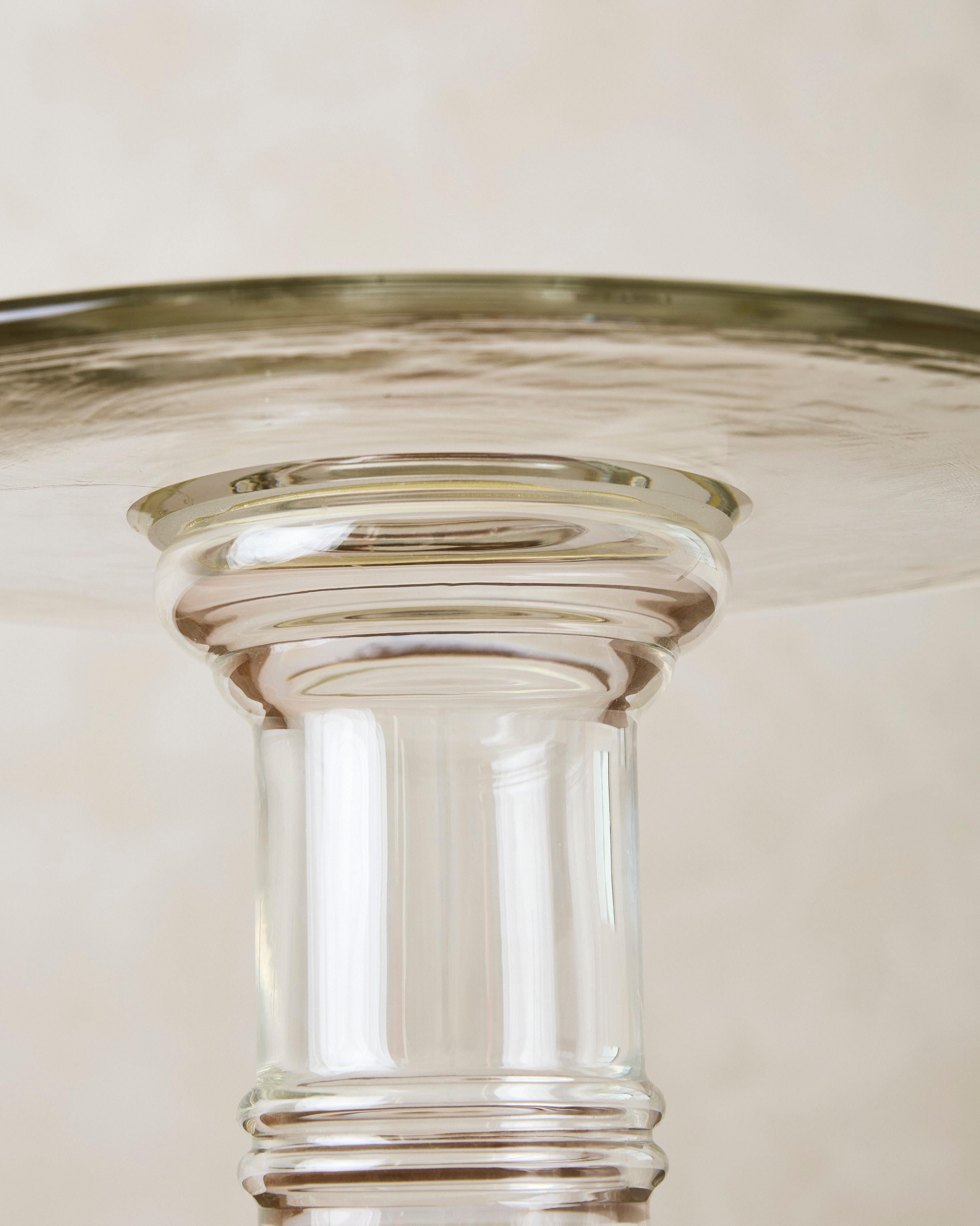 Cylindrical side table crafted from handblown sculpted Murano glass. 

