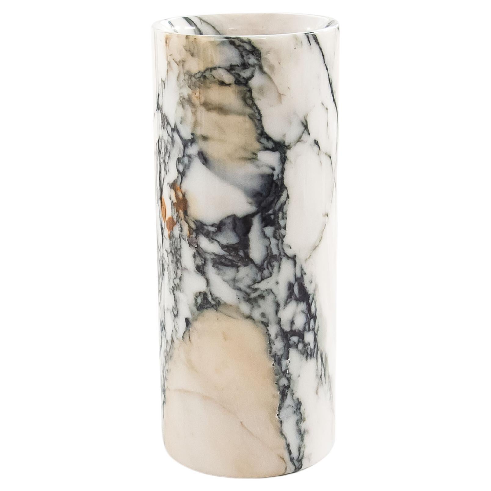 Cylindrical Paonazzo marble vase made in Italy, Carrara.

Each piece is in a way unique (since each marble block is different in veins and shades) and handcrafted in Italy. Slight variations in shape, color and size are to be considered a