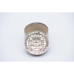 Cylindrical pill box with D. João coin