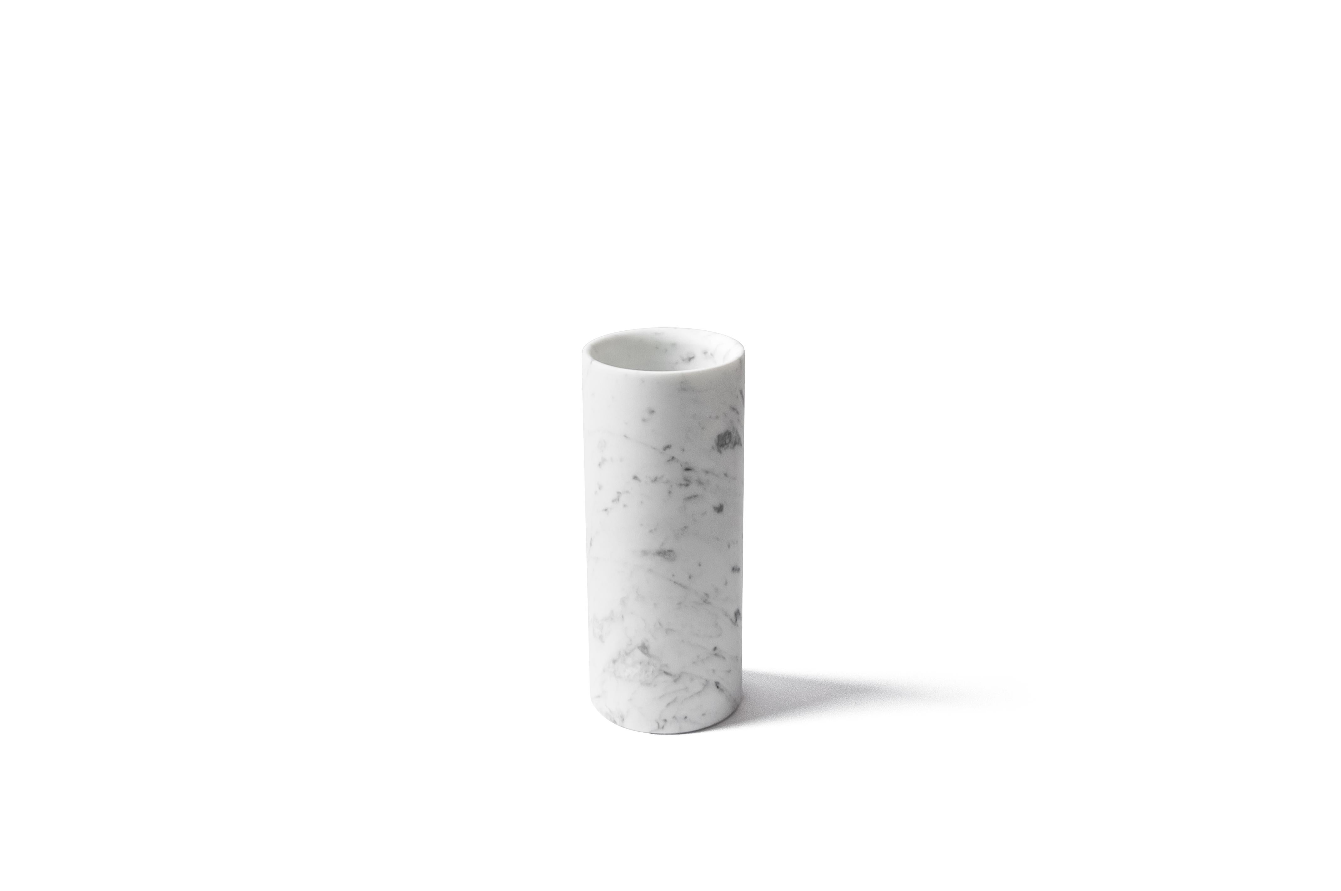 Cylindrical satin white Carrara marble vase made in Italy, Carrara.
Each piece is in a way unique (since each marble block is different in veins and shades) and handcrafted in Italy. Slight variations in shape, color and size are to be considered a