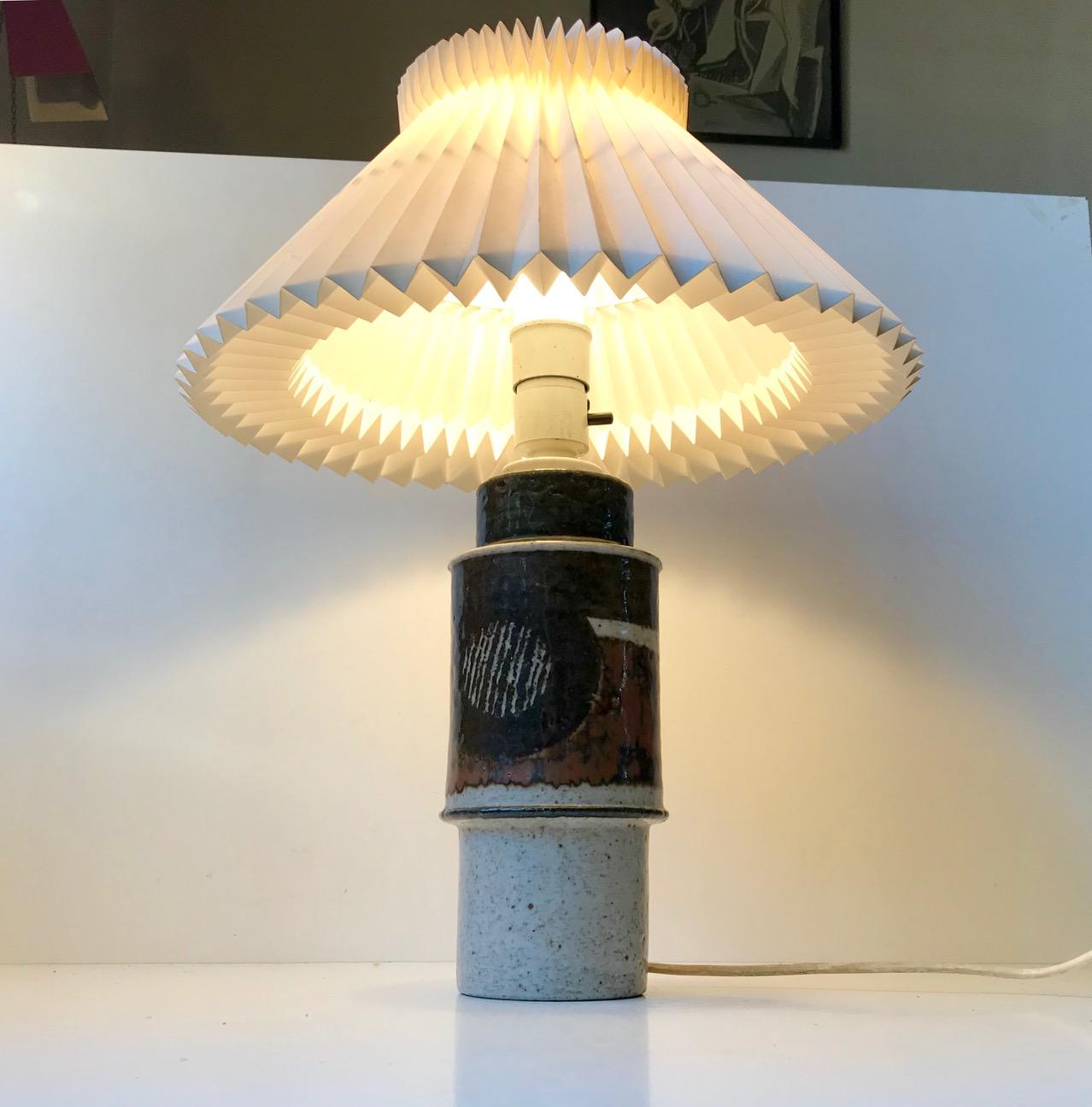 Inger Persson cylindrical stoneware table lamp. Rörstrand. Signed by hand: IP, Ateljé, Sweden. This light features on/of switch to the socket. The shade is not included. Please personalize with your own.