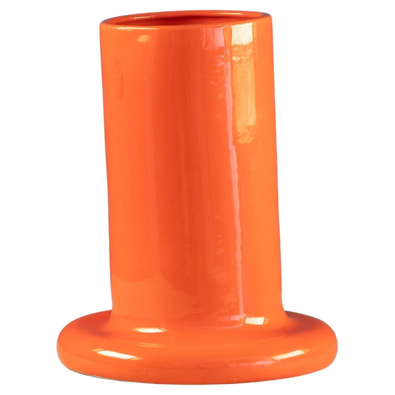 Cylindrical vase and countersunk base in orange ceramic 1970 in vendita