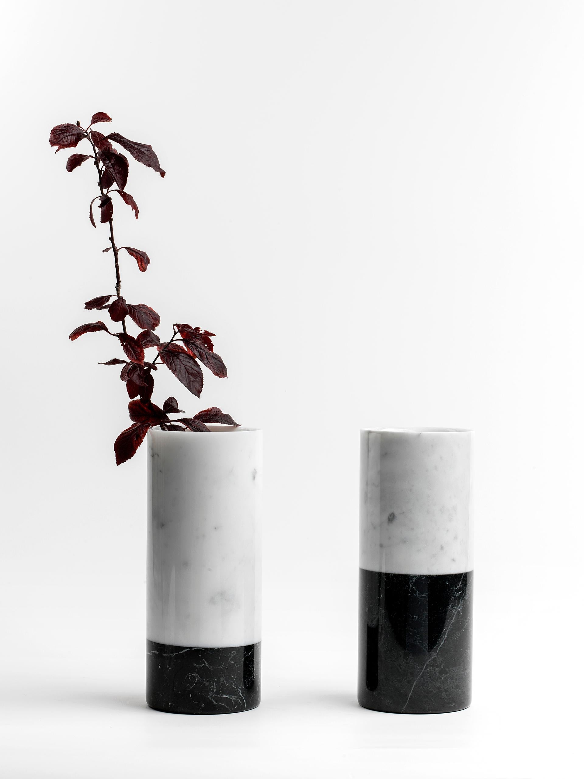 Cylindrical white Carrara and black Marquina marble vase with lower bottom black band, made in Italy, Carrara.
Each piece is in a way unique (since each marble block is different in veins and shades) and handcrafted in Italy. Slight variations in