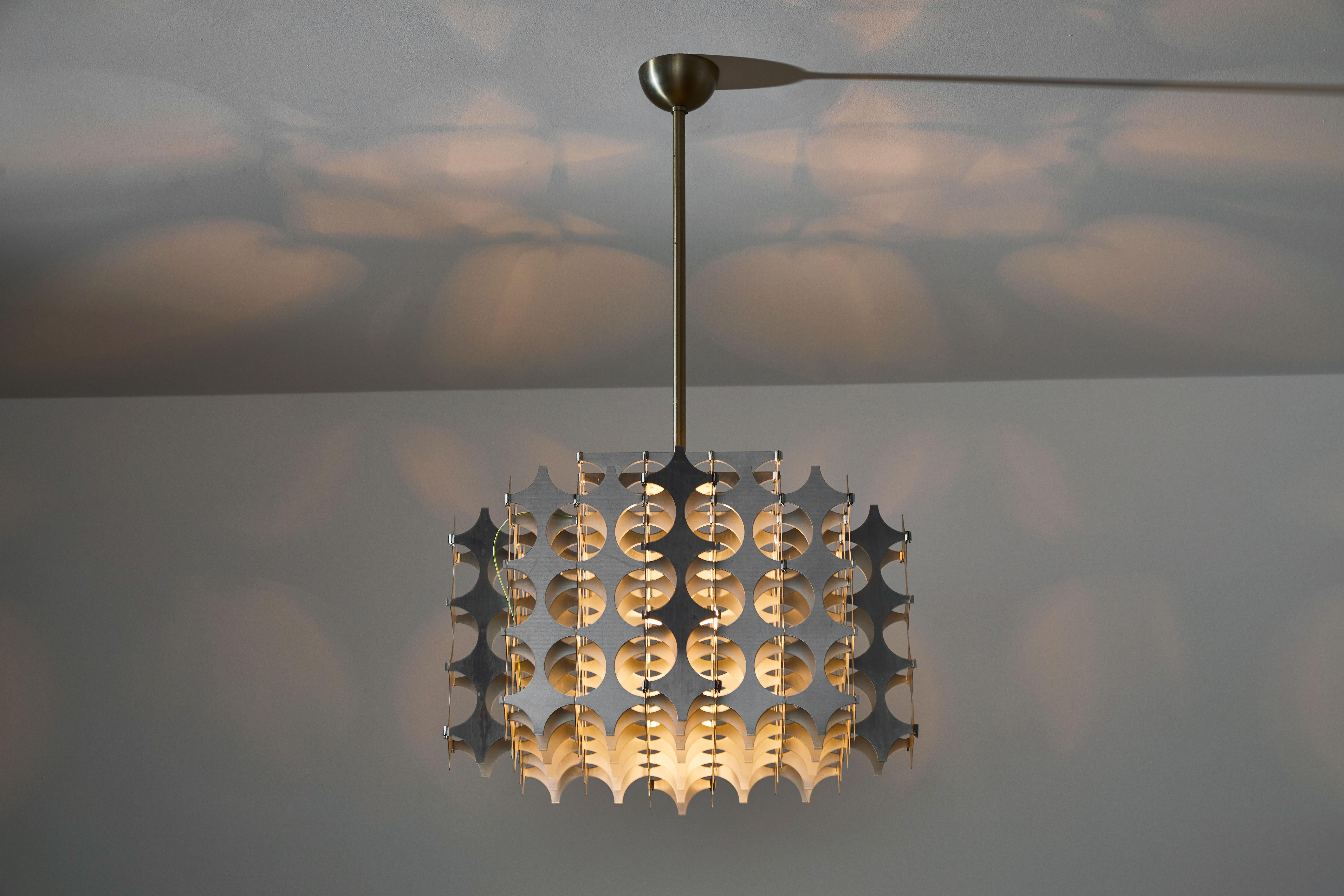 Cynthia pendant by Mario Marenco for Artemide. Designed and manufactured in Italy, 1968. Brushed aluminum, brass. Rewired for US junction boxes. Original canopy. Takes one E27 100w maximum bulb. Bulbs are provided as a one time courtesy.

 