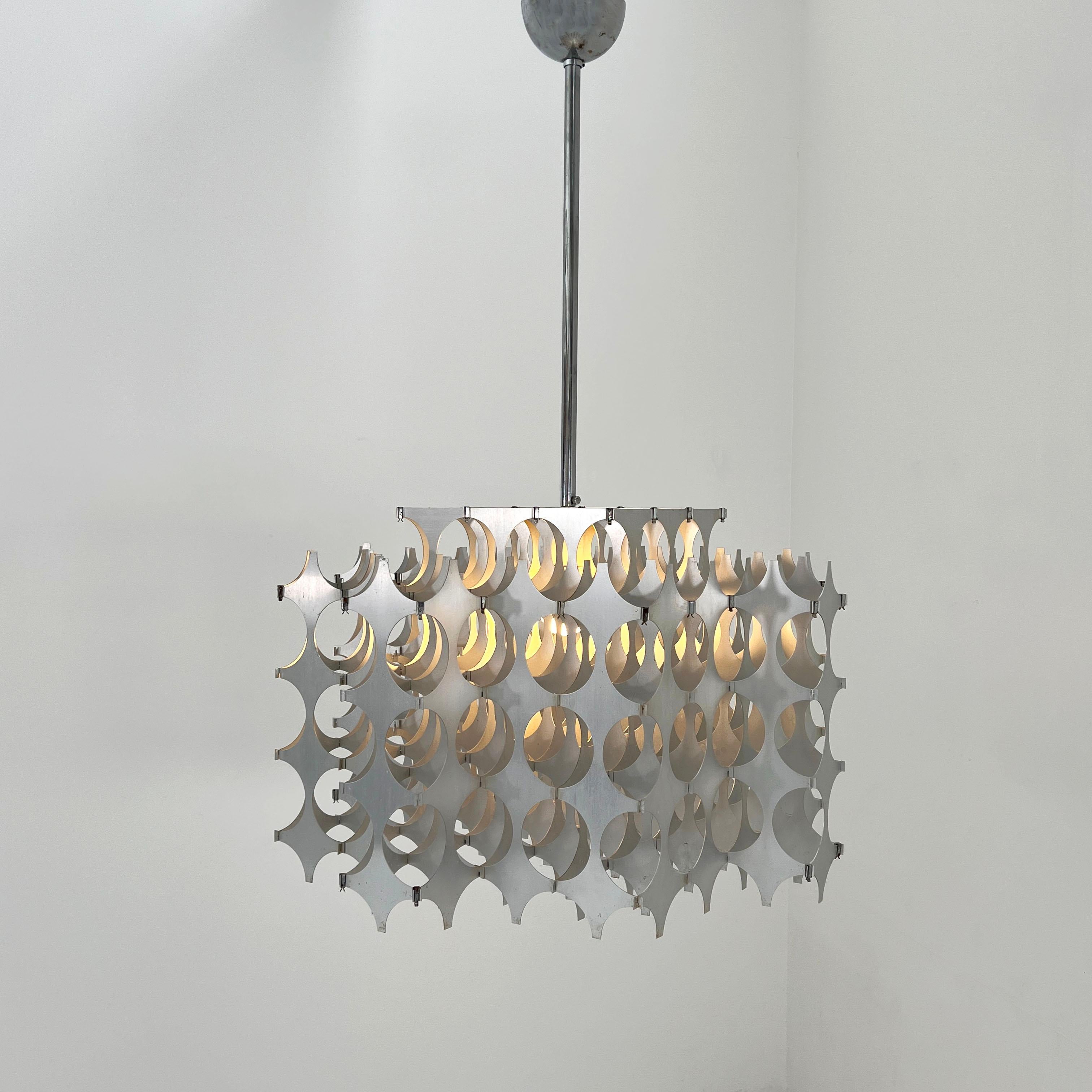 Cynthia Pendant Light by Mario Marenco for Artemide, 1960s

Designer - Mario Marenco 
Producer - Artemide
Model - Cynthia Pendant Light
Design Period - Sixties
Measurements - Width 61 cm x Depth 61 cm x Height 102 cm
Materials - Metal
Color - Silver