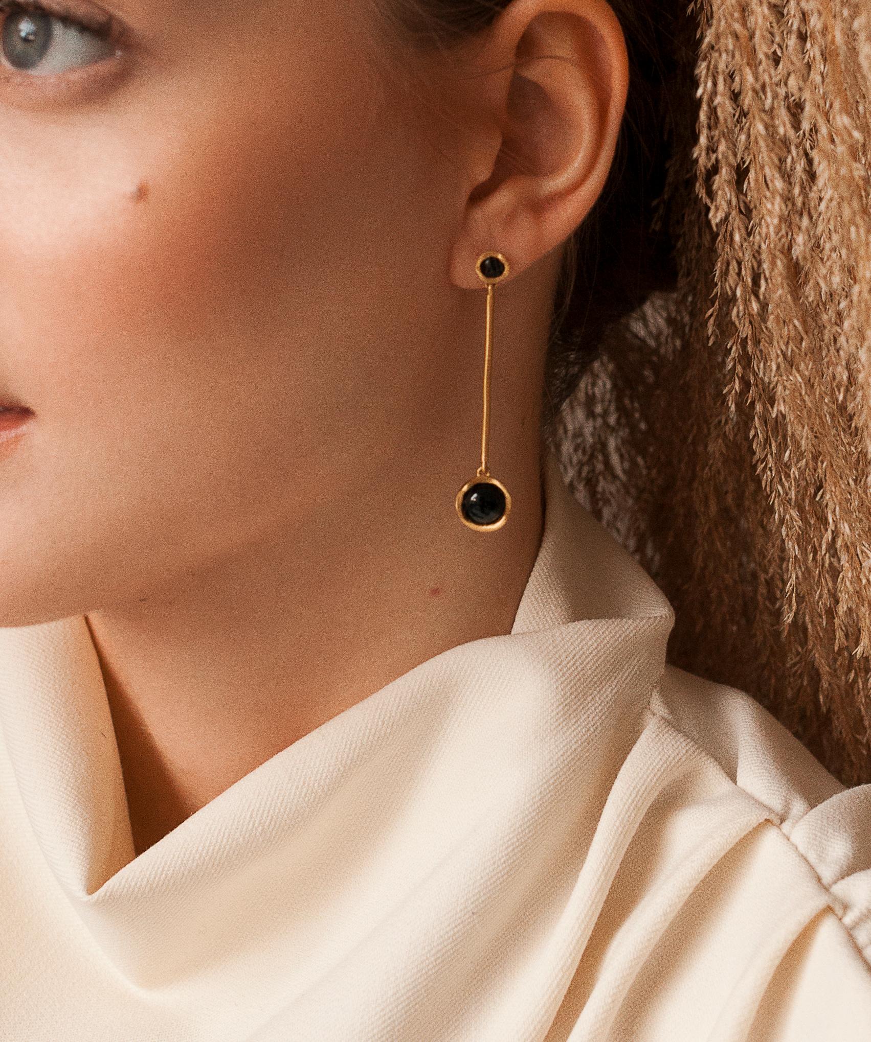 Handcrafted in brass and gold dipped in 22k gold our Parallel earrings are part of Cyntia Miglio's 