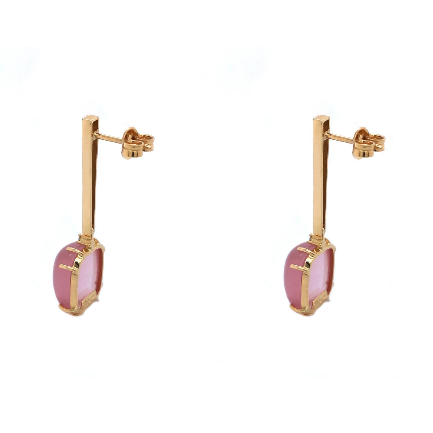Our favorite Pendulum earrings now with stunning rose quartz gemstones and diamonds.

Materials:

- 18k solid gold earrings

-A pair of 1.5mm G color, VS-2 clarity diamonds  

- 2 natural Brazilian rose quartz rectangle shape, cabochon style