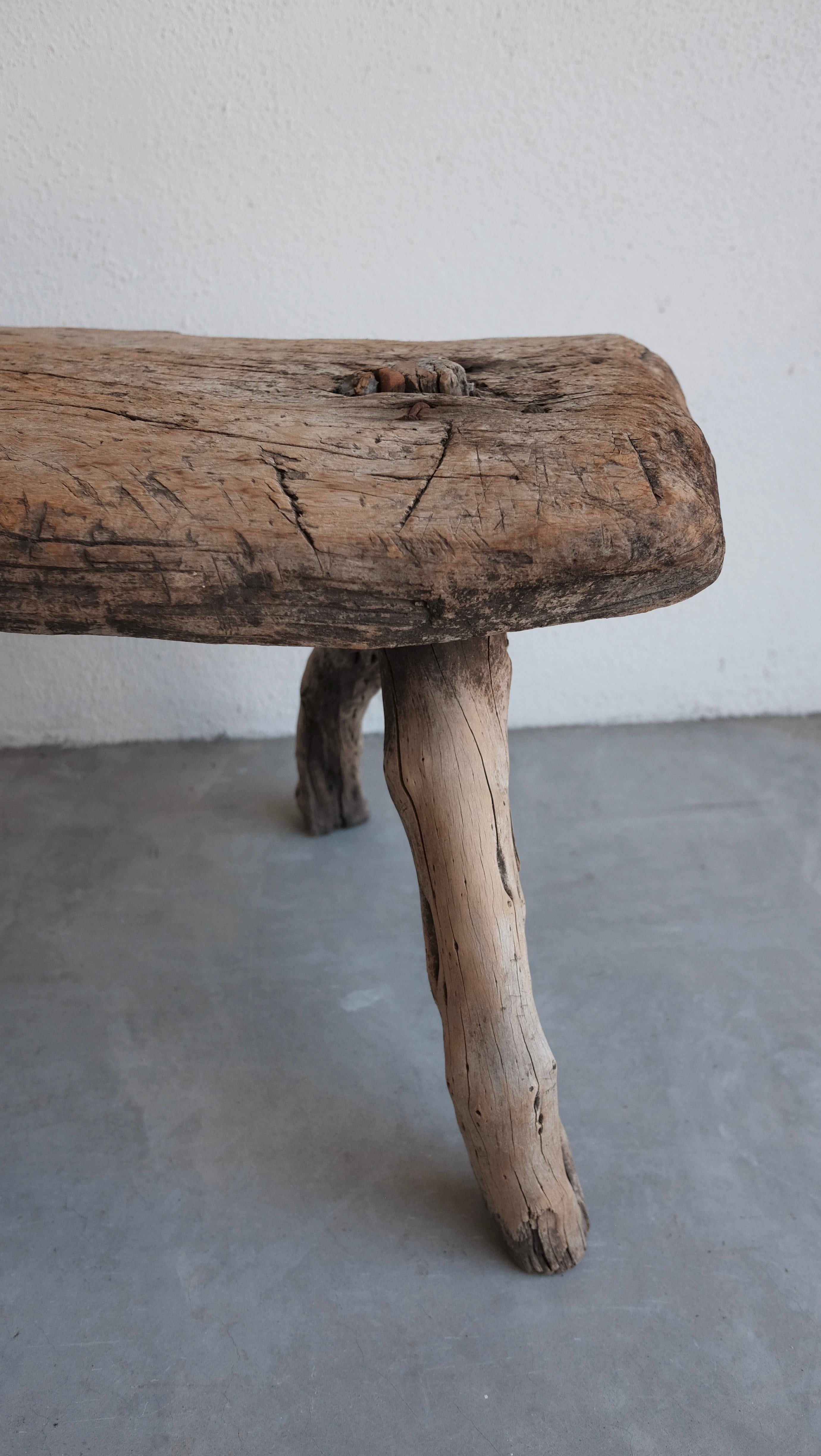 Primitive-style cypress bench from Jalisco, circa 1950s. Rare piece.