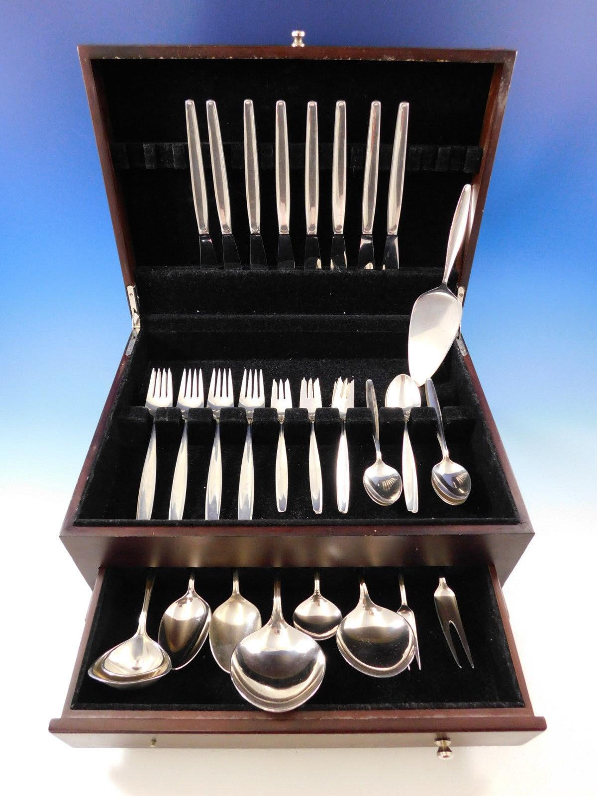 Exquisite dinner size cypress by Georg Jensen Mid-Century Modern sterling silver flatware set of 42 pieces. This set includes:

8 dinner knives, 8 3/4