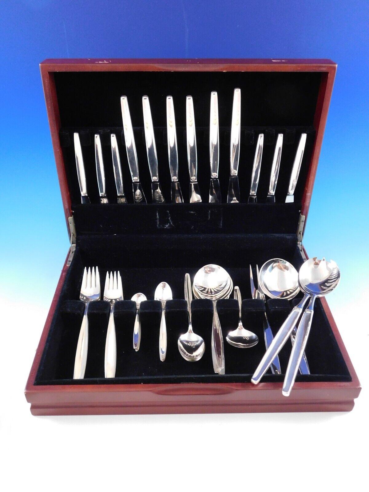Mid-Century Modern Cypress by Georg Jensen sterling silver Flatware set, 53 pieces. This set includes:

6 Dinner Size Knives, long handle, 8 7/8