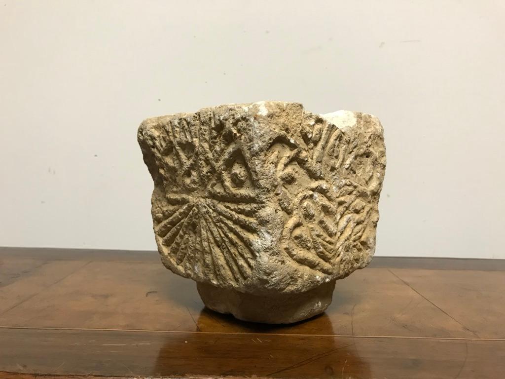 A very interesting Byzantine Cypriot limestone mortar with unusual hand carved decoration on all four sides. It is possibly a re-purposed capital, the top hollowed out at some point to be used as a mortar. The most intact side also has the most