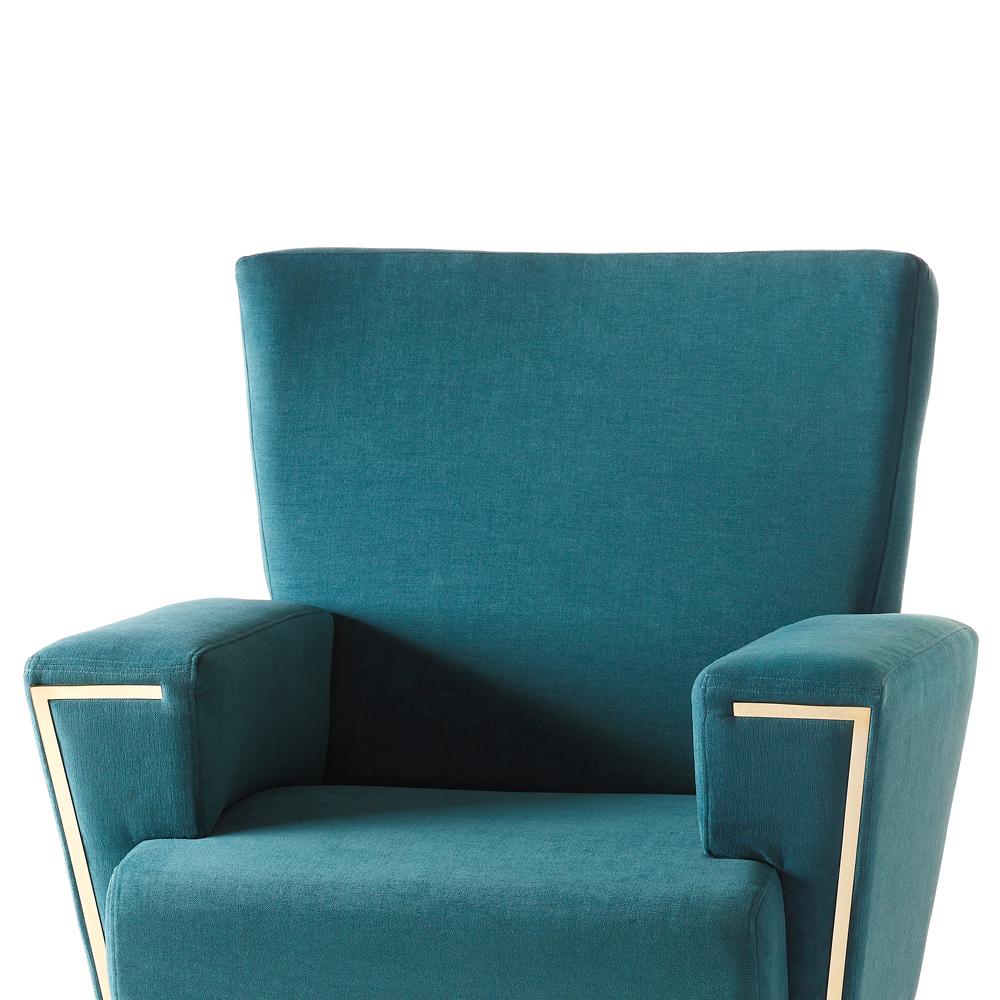 Sillón Chipre con estructura de madera maciza,
recubierta de tela de terciopelo turquesa. Detalles en
latón pulido, con pies de madera.
También disponible en taburete Chipre.