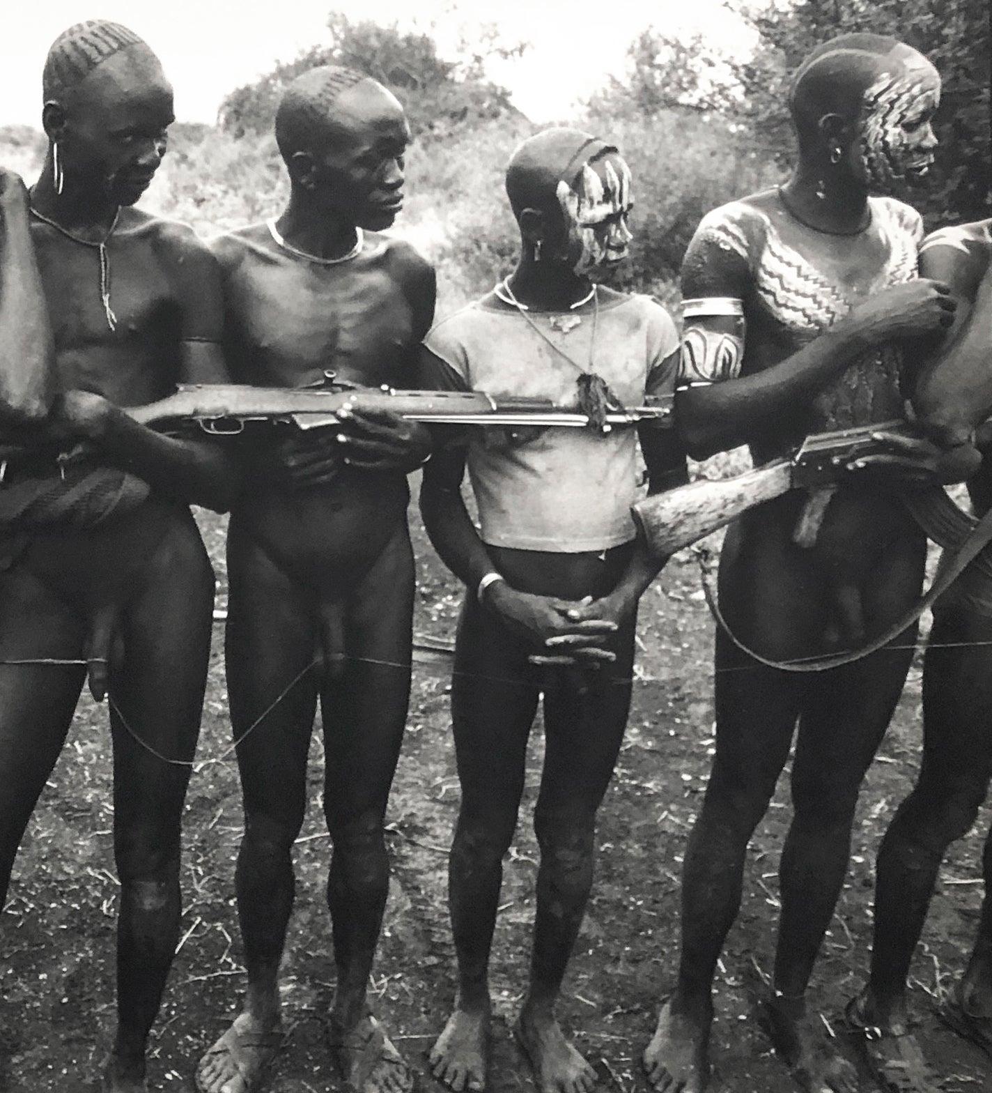 Mursi RoadBlock, Omo River Valley, Ethiopia - Photograph by Cyril Christo and Marie Wilkinson 