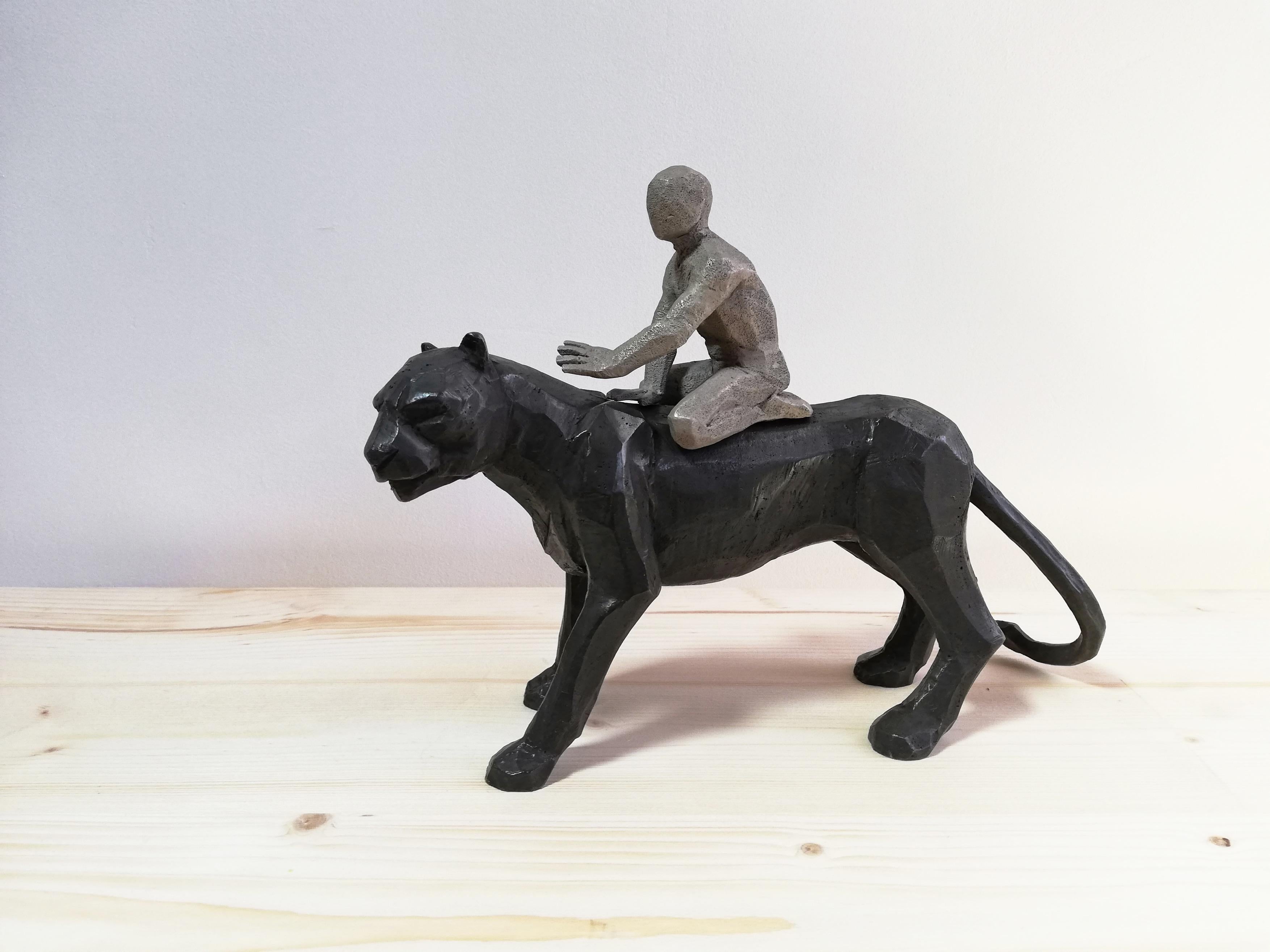 Cyrille André Figurative Sculpture - Passeur d'Ames bronze sculpture of a boy riding on a black panther's back 