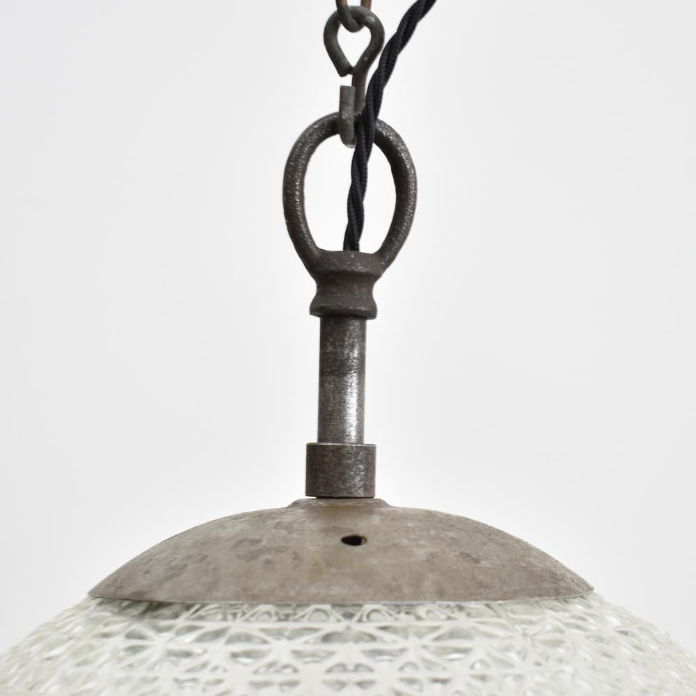 Czech antique glass pendant light large – A

These unique glass pendants were salvaged from a school hall in former Czechoslovakia, featuring unique cross-cut diamond glass. The glass provides a striking even glow when illuminated. The light