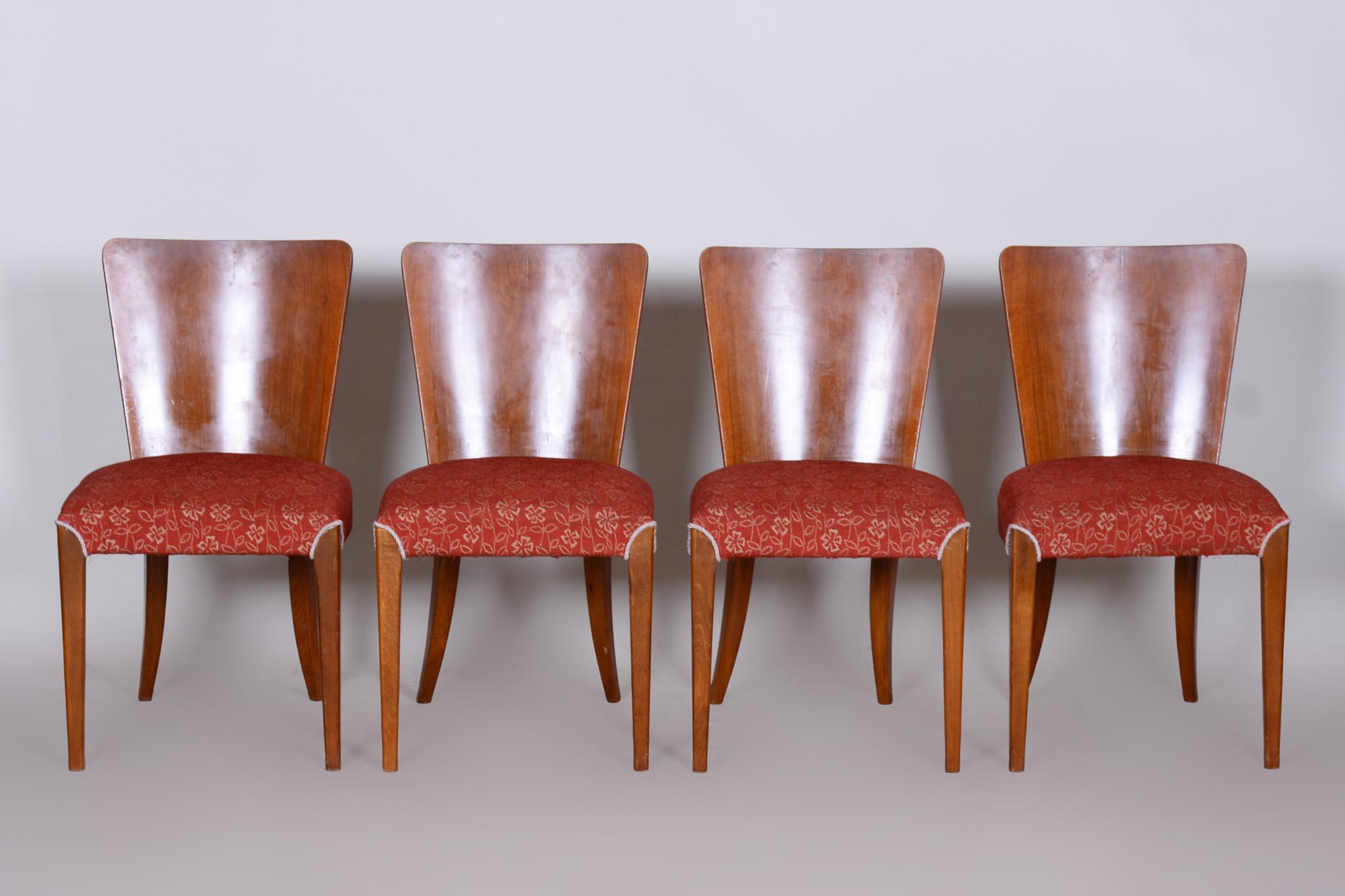 Czech Art Deco chairs, 4 pieces.
Material: Combination of beech and walnut veneer.
Period: 1940-1949

Well preserved original condition
Stable construction
Refreshed polish
Professionally cleaned upholstery

Made by architect Jindrich