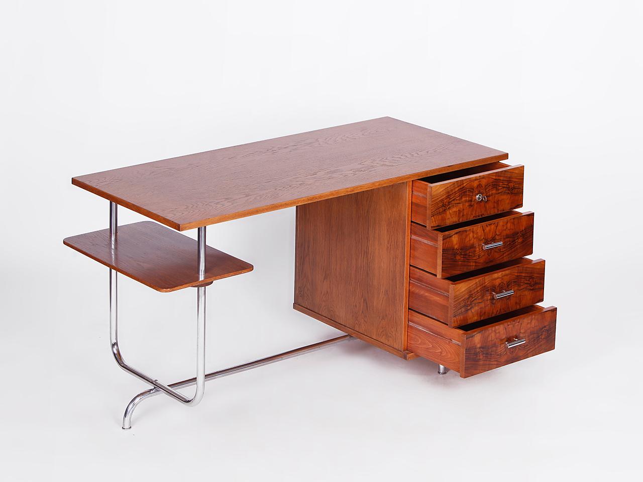 Tubular steel desk H 180 by Jindrich Halabala, manufactured in Czech Republic in the 1930s, with an oak body and veneered drawers in Caucasian walnut. Central locking. Completely restored, very nice original chrome plating. Rare design classic!