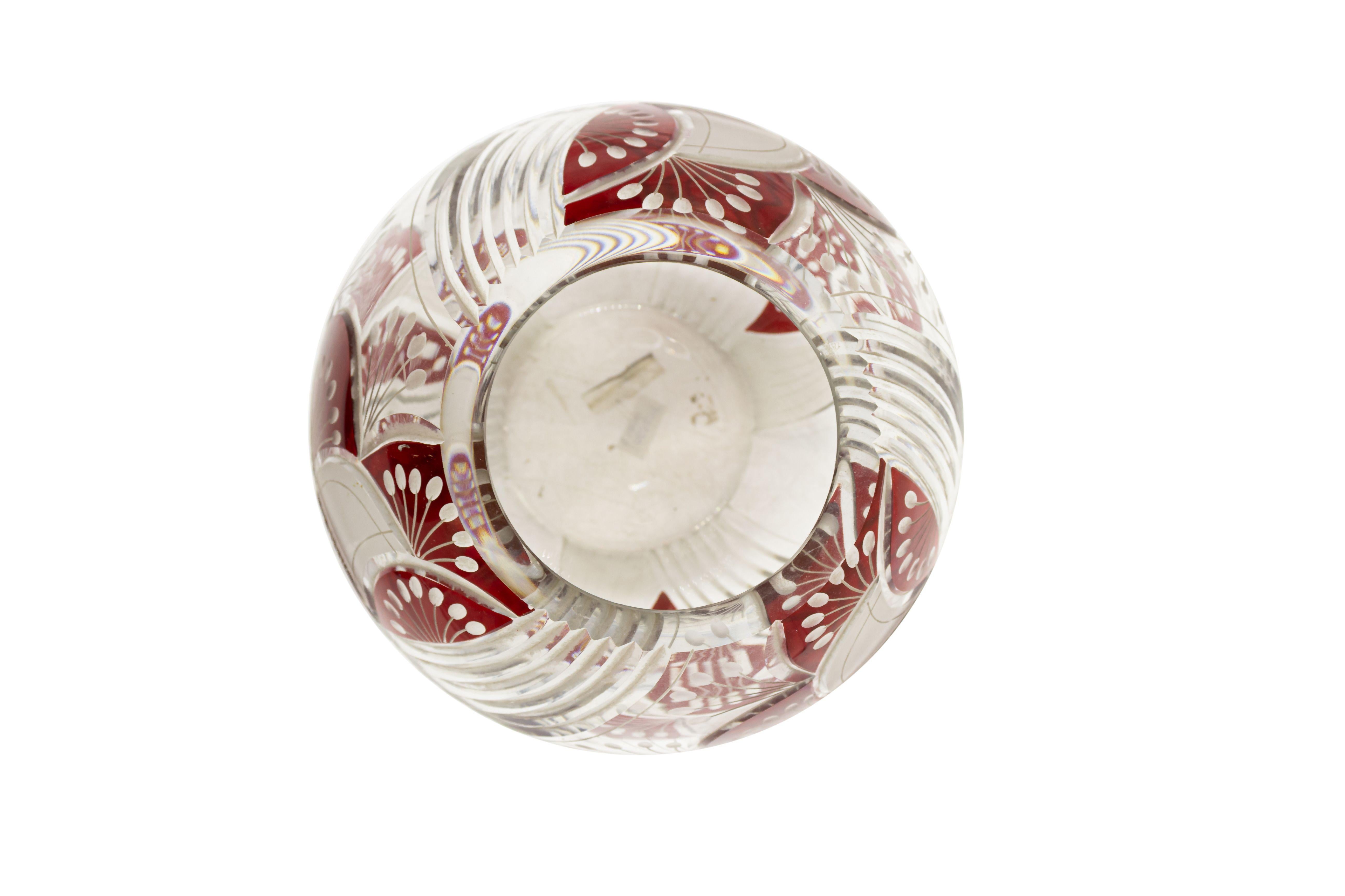 Art Deco Continental (Czechoslovakia) round vase with geometric cut glass design and ruby overlay trim.
 