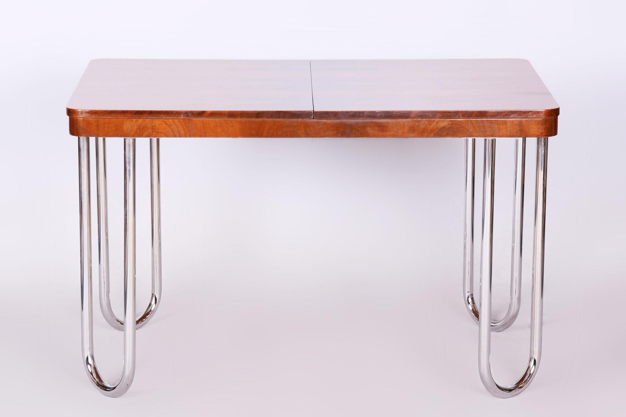 Czech Bauhaus folding dining table designed by Jindrich Halabala.

Period: 1930-1939
Material: walnut, chrome-plated steel
Restored.

Adjustable width in 2 dimensions:
120 and 170 cm (47.2 in and 47.2 in)

