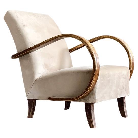 Sillón checo de madera curvada de Jindrich Halabala