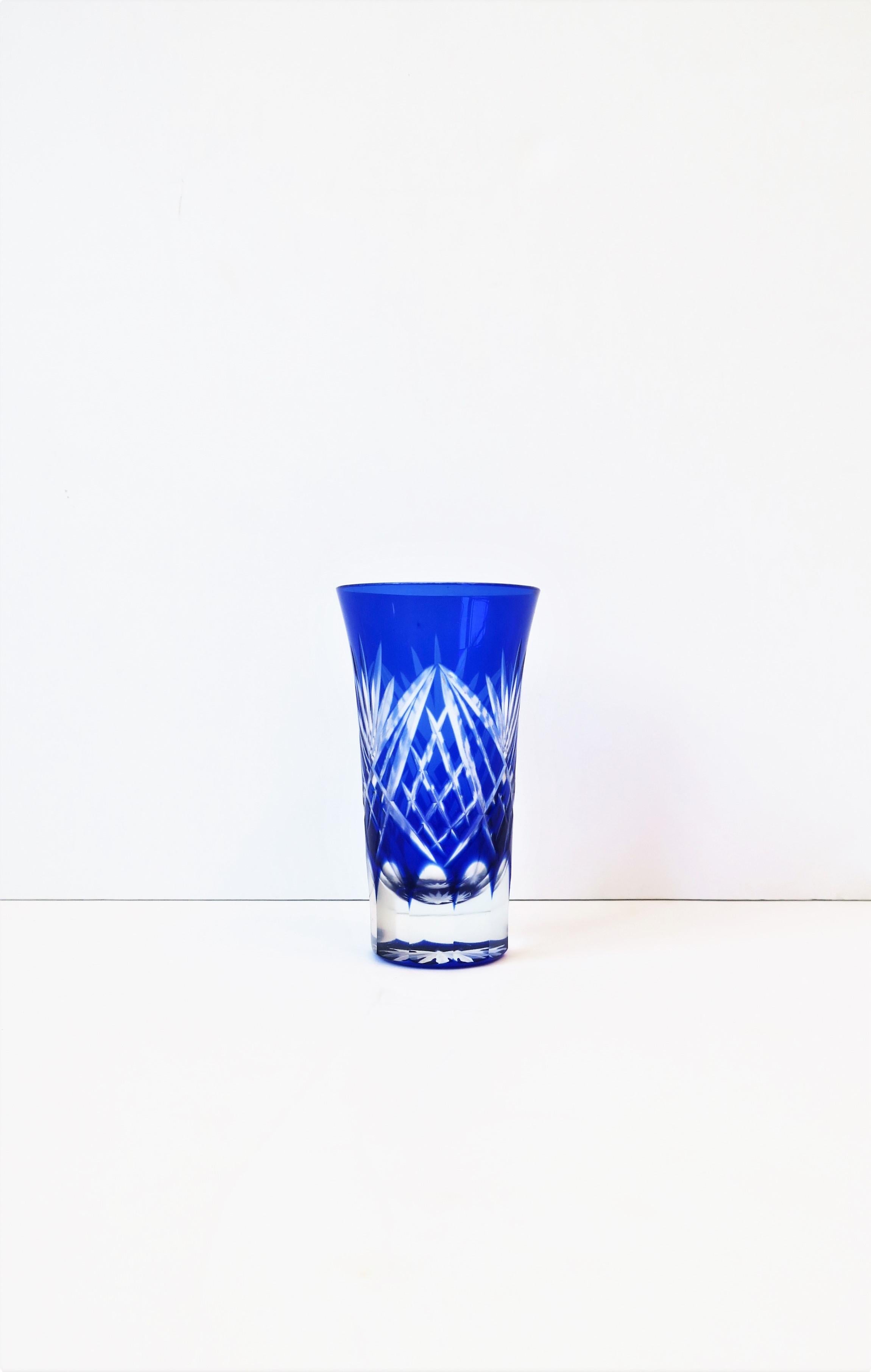 A beautiful Czech royal or cobalt blue Bohemian cut crystal drinking vessel or small vase, circa early to mid-20th century, Czechoslovakia. A beautiful piece with cut details from top to bottom, aka cut to clear. Piece is attributed to luxury