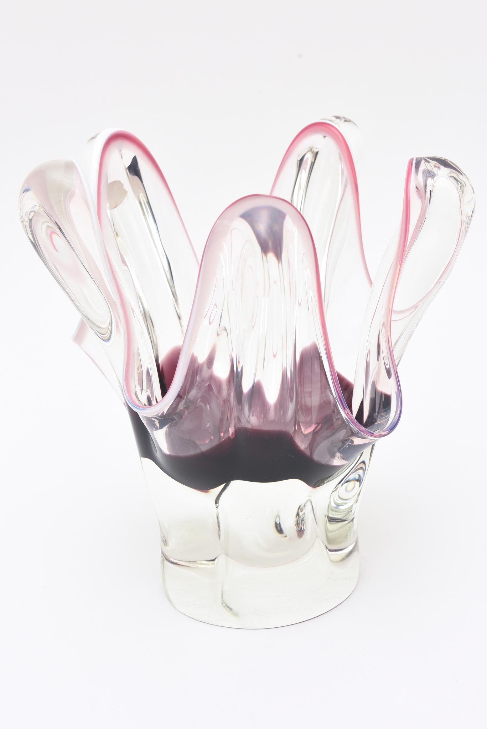 This unusual vintage Czech bohemia sommerso glass vase and or vessel is vintage from the 60s. The form is tentacle octopus shape with irregular forms that look like organic shapes. The sommerso colors are purple, to aubergine to pink outlines with