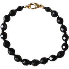 Czech Bohemian 20th Century Black Faceted Glass Bead Gold Tone Clasp Bracelet