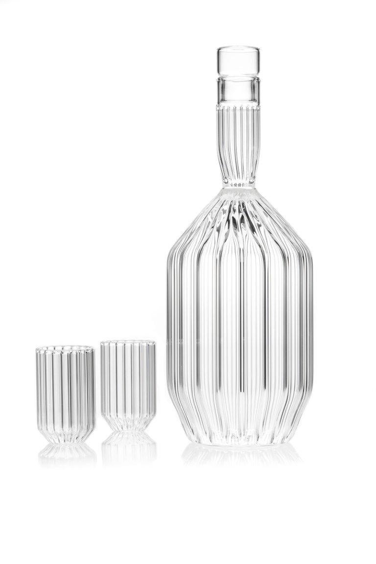 Margot decanter and eight Dearborn liqueur shot mini clear glass set 

This item is also available in the US.

Entirely hand-formed without the use of molds, the contemporary minimal Margot Decanter is an ideal companion to any evening spent