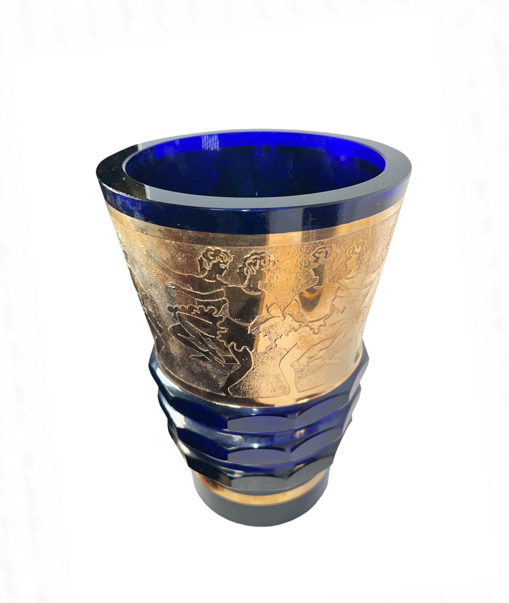 A pair of mid 20th century Czech cobalt blue vases with adults, dancing and Holding hands in a continuous circle in gold gilding around the rim. 