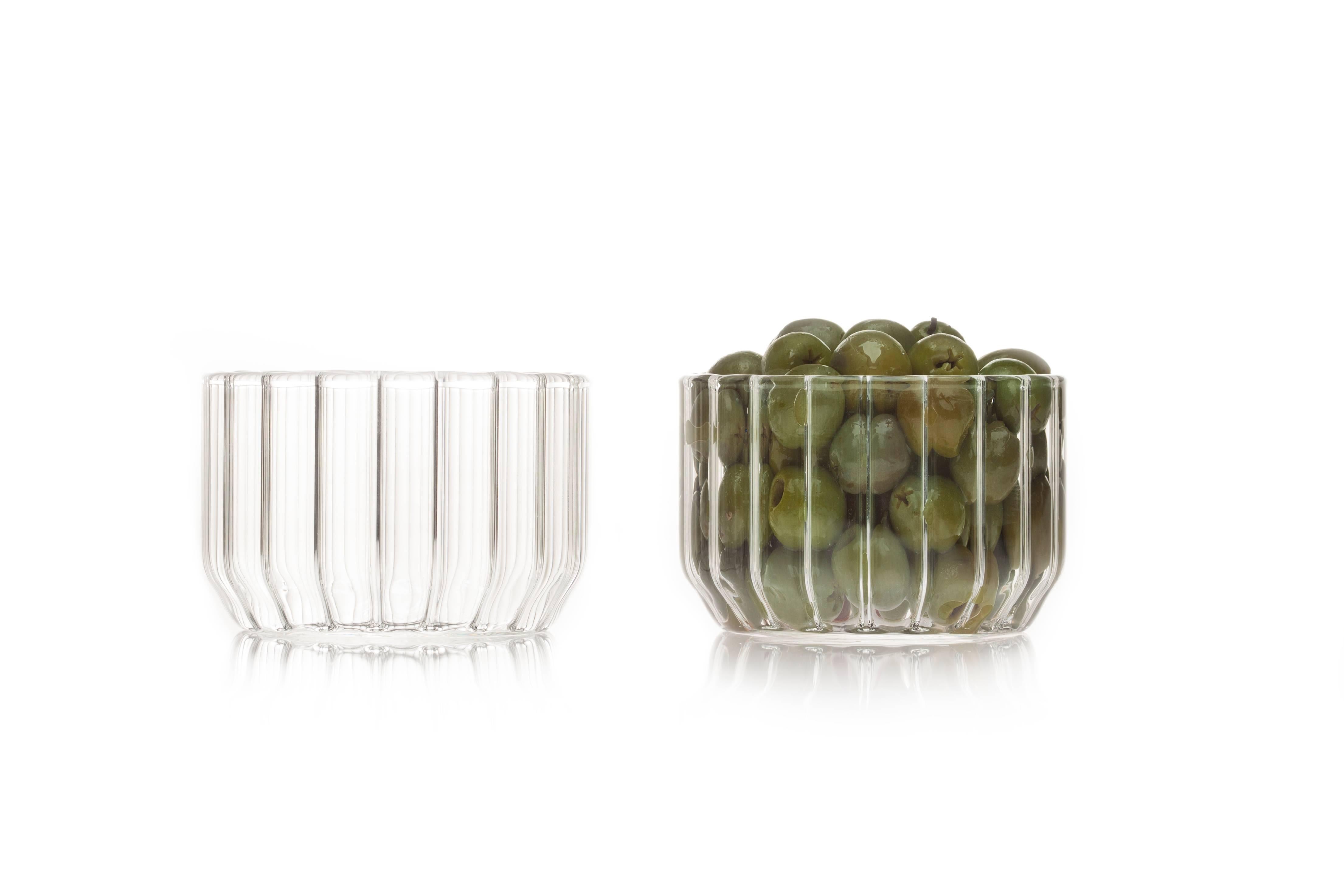 Dearborn large glass bowl

The handmade Czech contemporary large glass bowl is perfect for snacks during cocktail hour, candies, catchall, or even in the bathroom as a vessel for jewelry.

Perfect for everyday or formal dining settings, modern