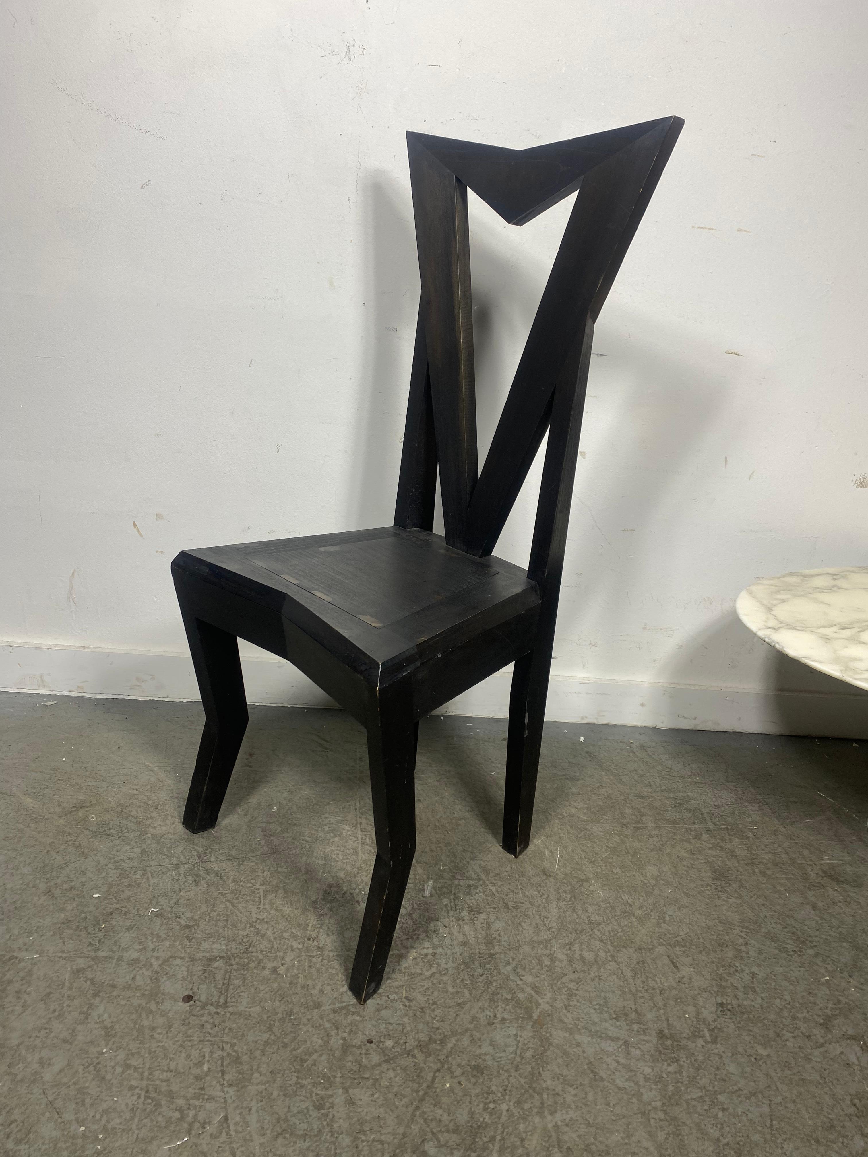 The expressive forms of this Janák's Cubist chair secured it a place among the most distinctive and most frequently published pieces of early Czech Cubist furniture. This beautiful and expressive chair is also very comfortable to sit on. The