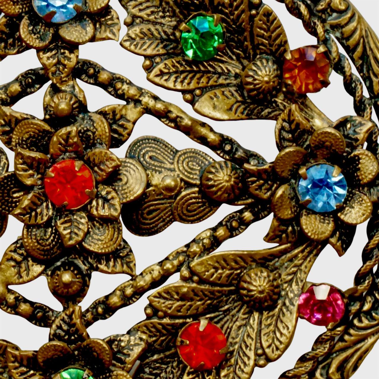Beautiful Czech gilt metal and black enamel floral brooch, with lovely multi coloured glass stones. 

This is a large brooch, measuring length 7.2 cm / 2.8 inches by 6.1 cm / 2.4 inches. The brooch is in very good condition. We have restuck one