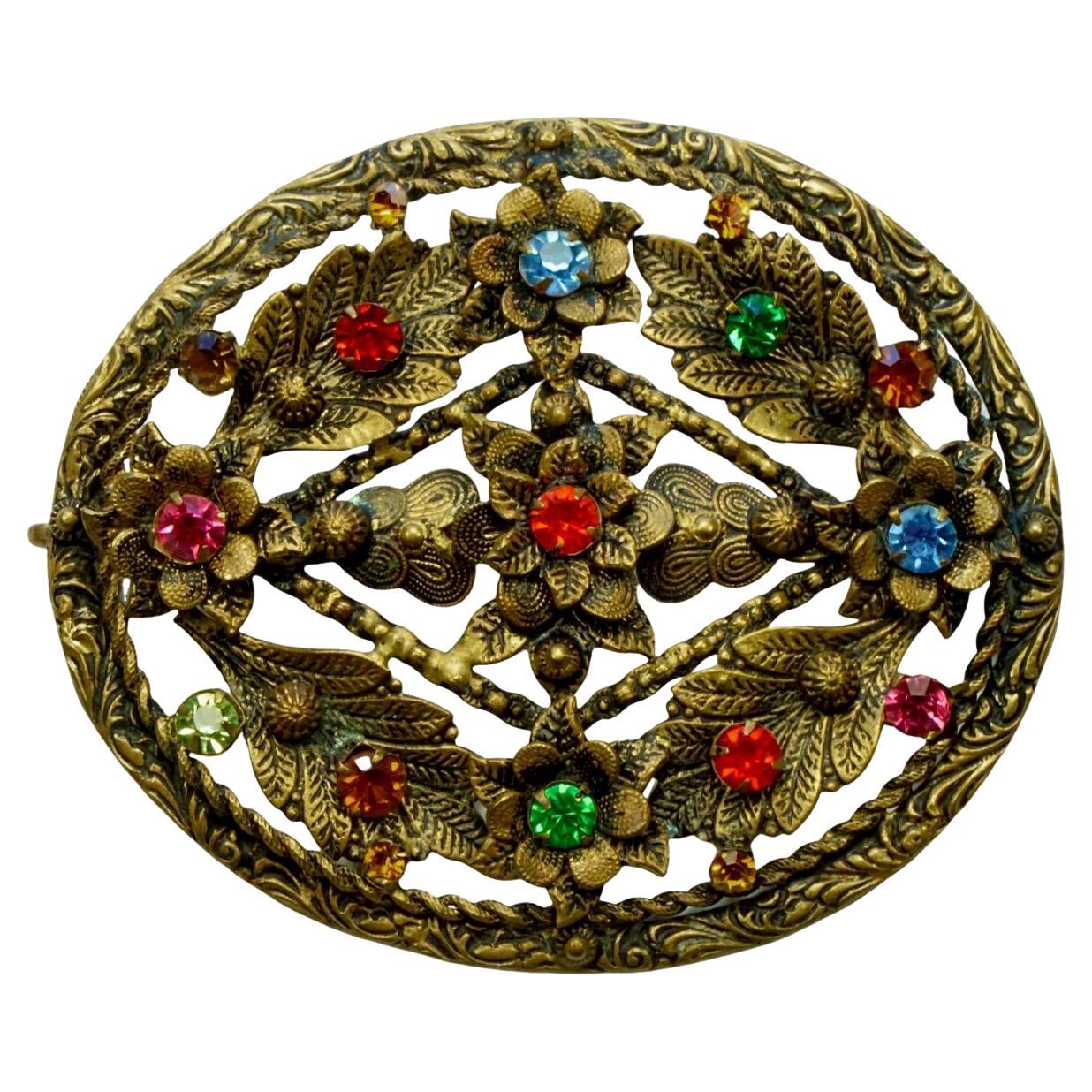 Czech Gilt Metal Black Enamel and Multi Coloured Glass Floral Brooch circa 1930s For Sale