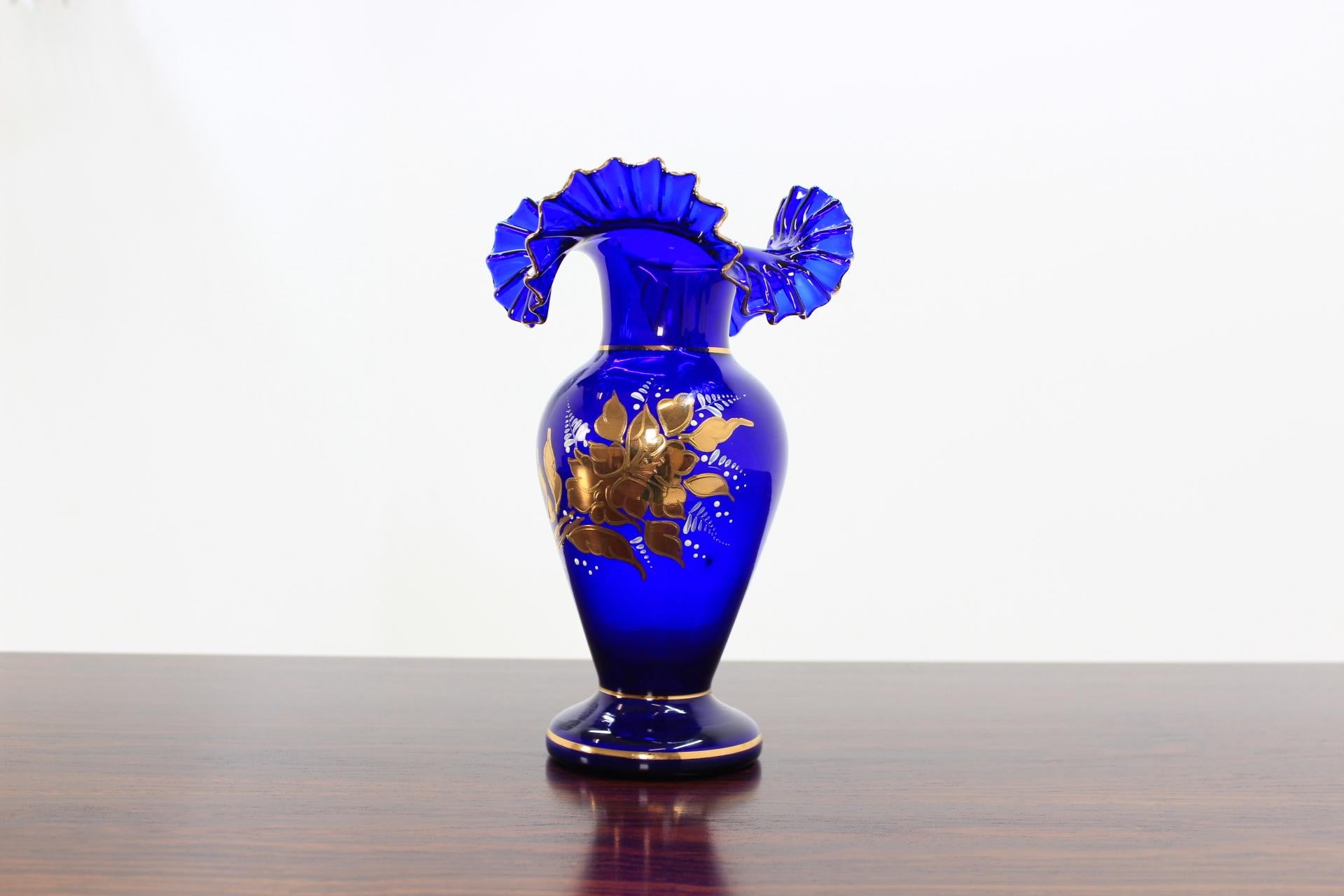 The item made of blue glass, hand painted. Made in Czechoslovakia. Original condition.