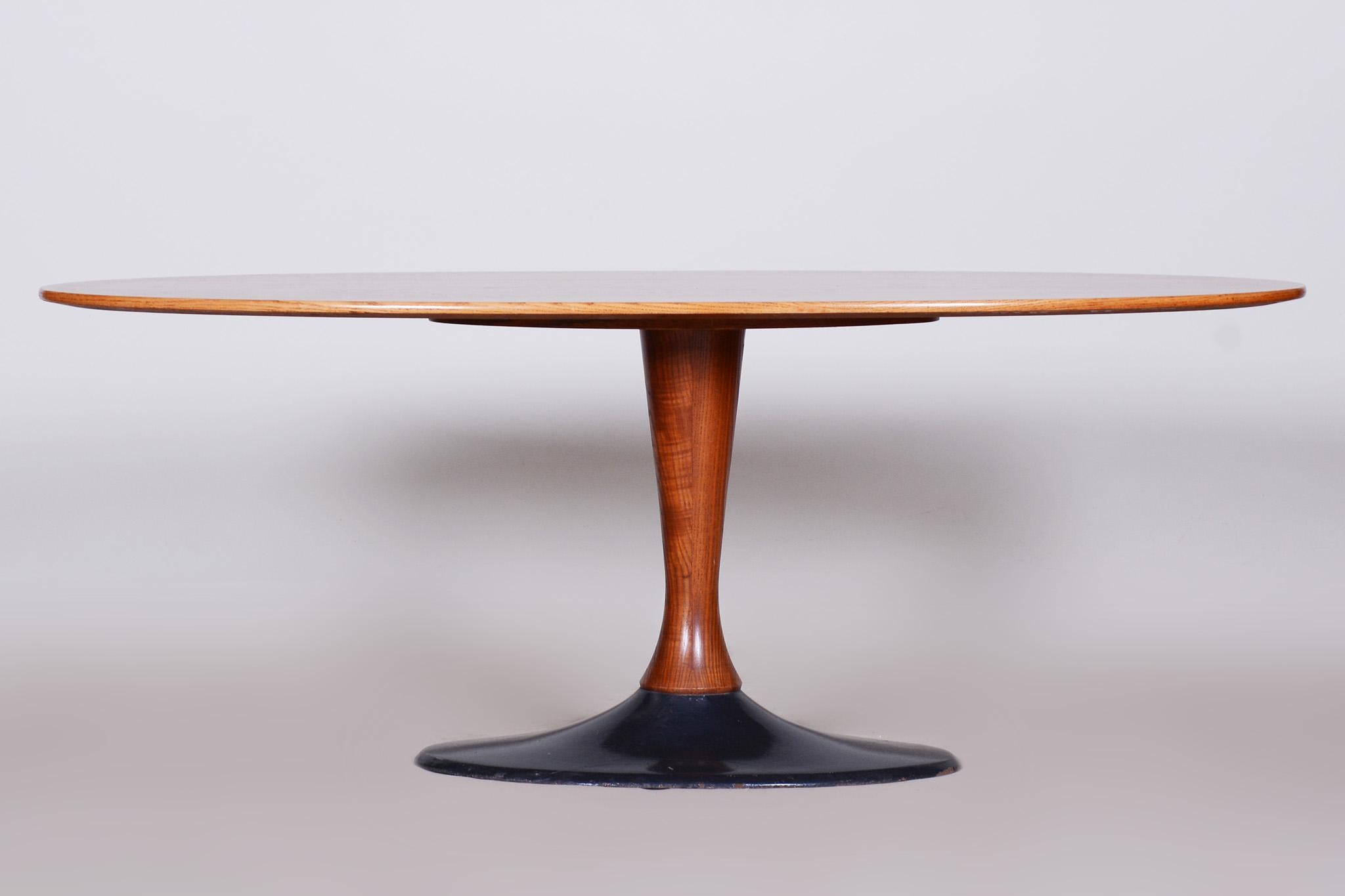 Mid-Century Modern Czech Mid-Century Rosewood Oval Table with Cast Iron Base, 1950s For Sale