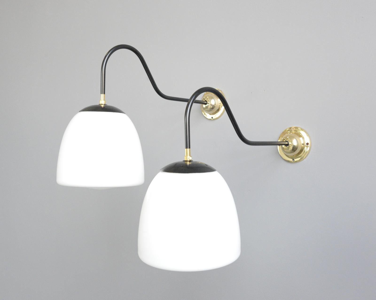 Czech opaline wall lights, circa 1940s

- Price is per light (5 available)
- Curved arm with cast brass wall plate
- Wires directly into the wall
- Takes E27 fitting bulbs
- Czech, 1940s
- Measures: 62cm deep x 25cm wide x 42cm