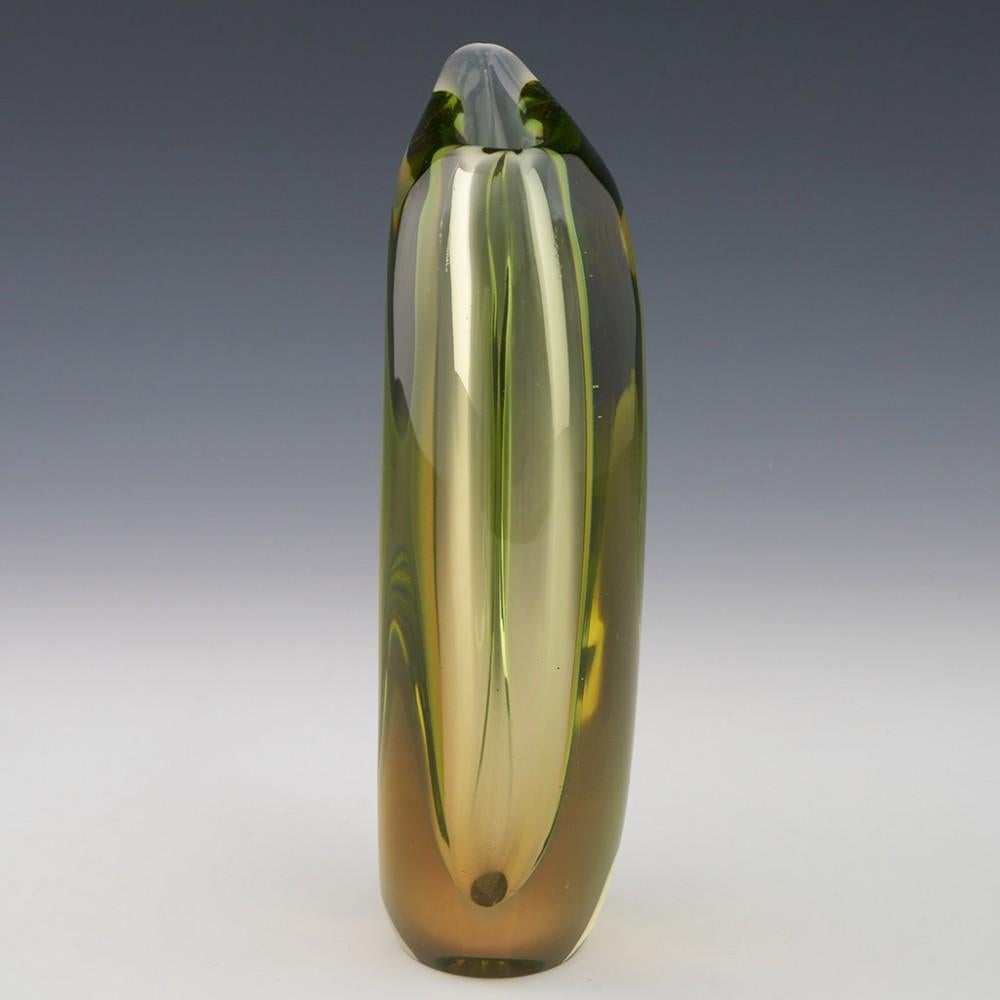 Czech Skrdlovice Amber and Green Cased Vase Pattern 6011, 1960s 

Designed by Marie Stahlikova. One cannot help but be reminded of Murano Sommerso vases of the same period. The Venetian influence penetrated the filter of anti-western communist