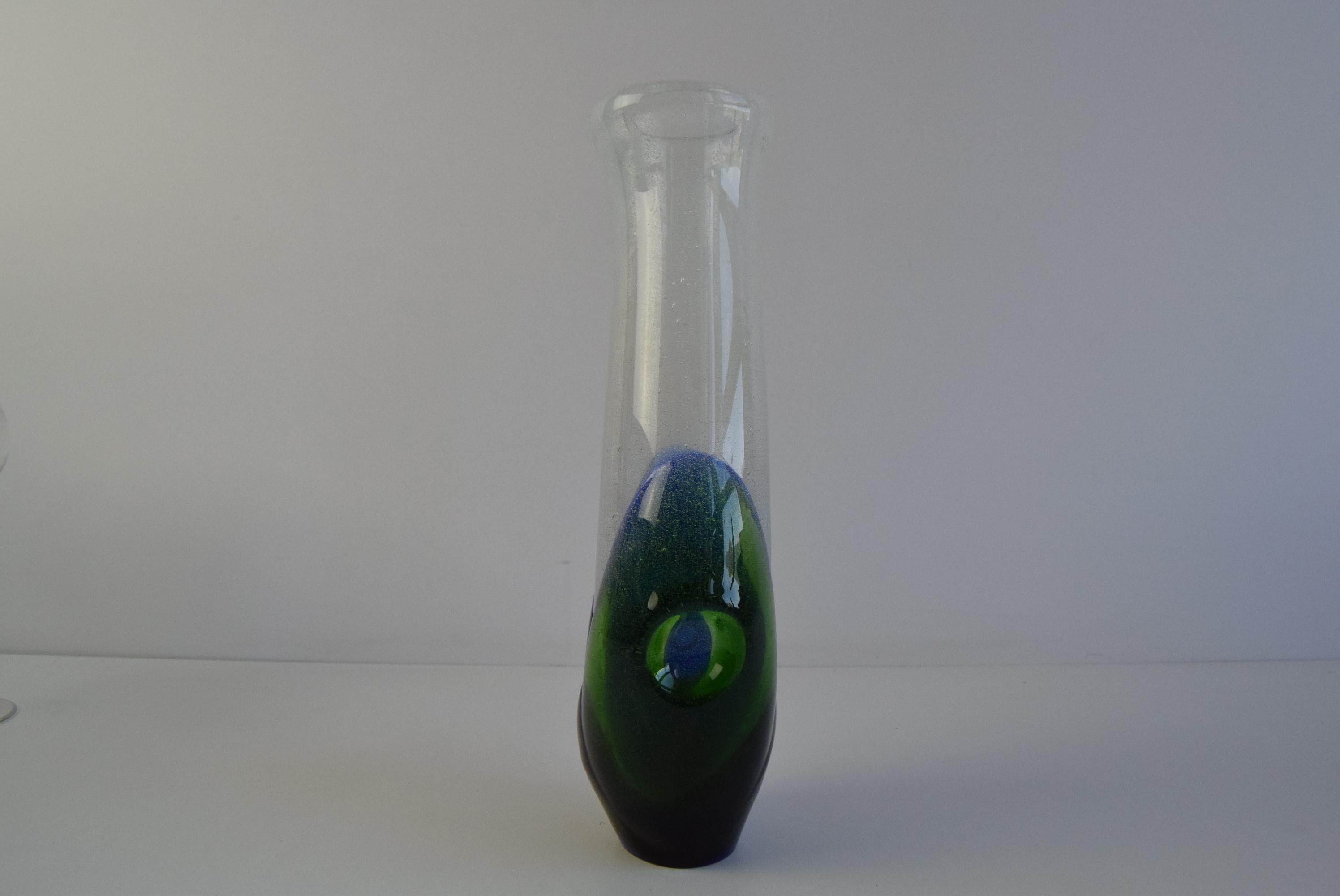 A stunning hand-blown Sommerso art glass vase from Czechoslovakia, circa 1970s. Featuring vibrant layers of deep cobalt blue and emerald green encased in clear glass, this sculptural piece reflects the iconic design style of Josef Hospodka for