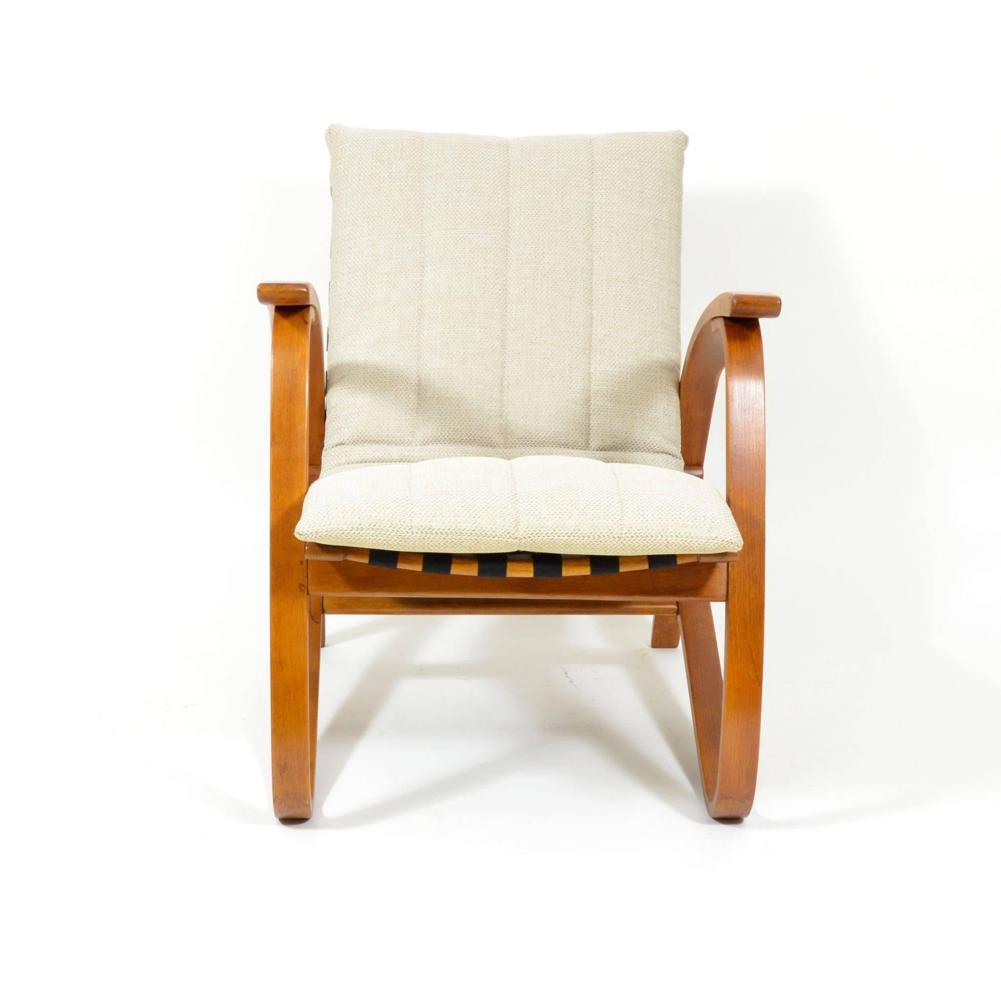 This armchair was designed by Jan Vanek in the 1930s. The hemp straps have been renewed and the wooden parts are after complete renovation. The cover is made from quality furniture fabric and it is possible to wash it without the inside padding.